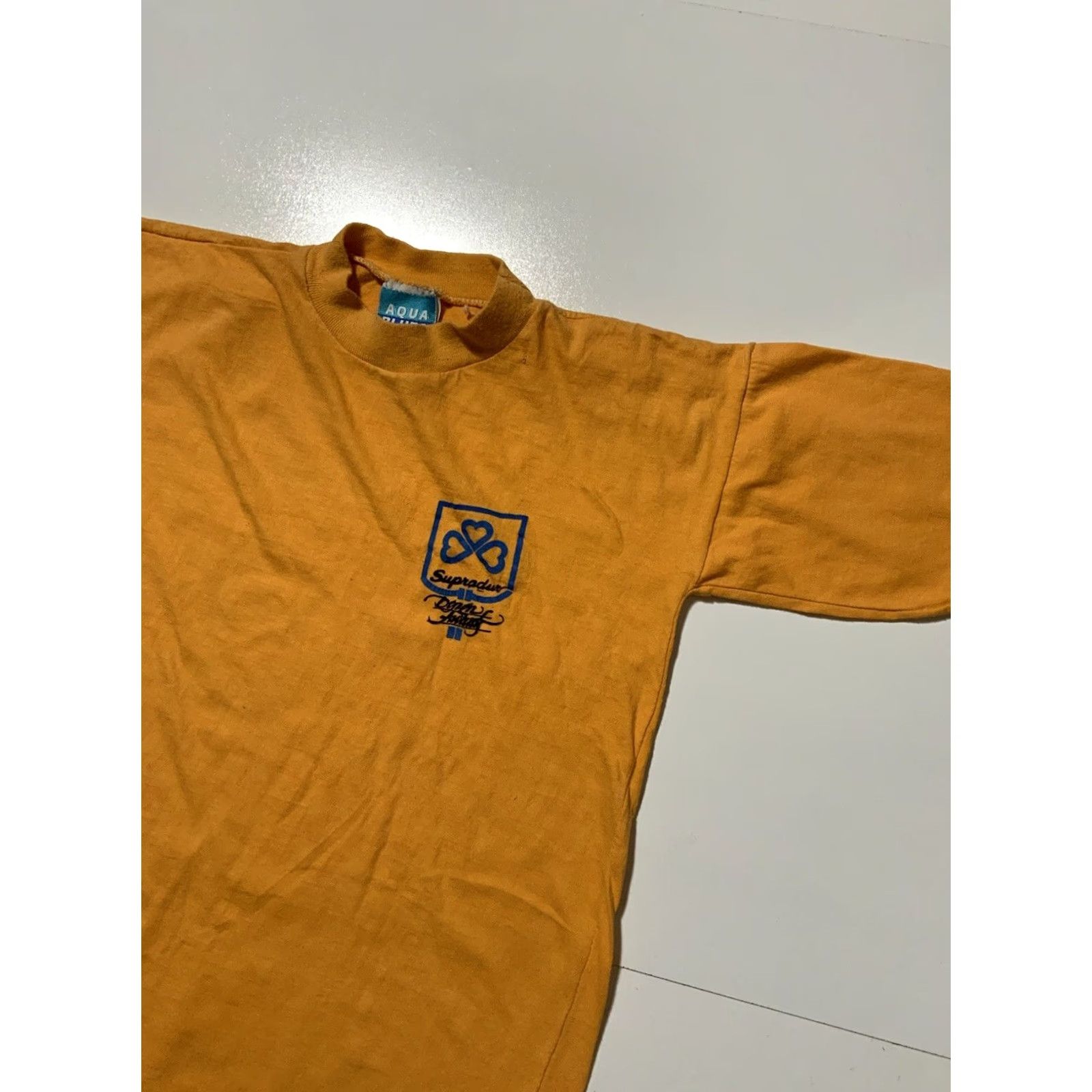 Vintage VINTAGE 80s Aqua Blues Supradur Single Stitch Yellow S/S Graphic T-Shirt Sz. M Shirt Adults M Yellow Graphic Supradur 1980s Mens Women? Size US S / EU 44-46 / 1 - 3 Thumbnail
