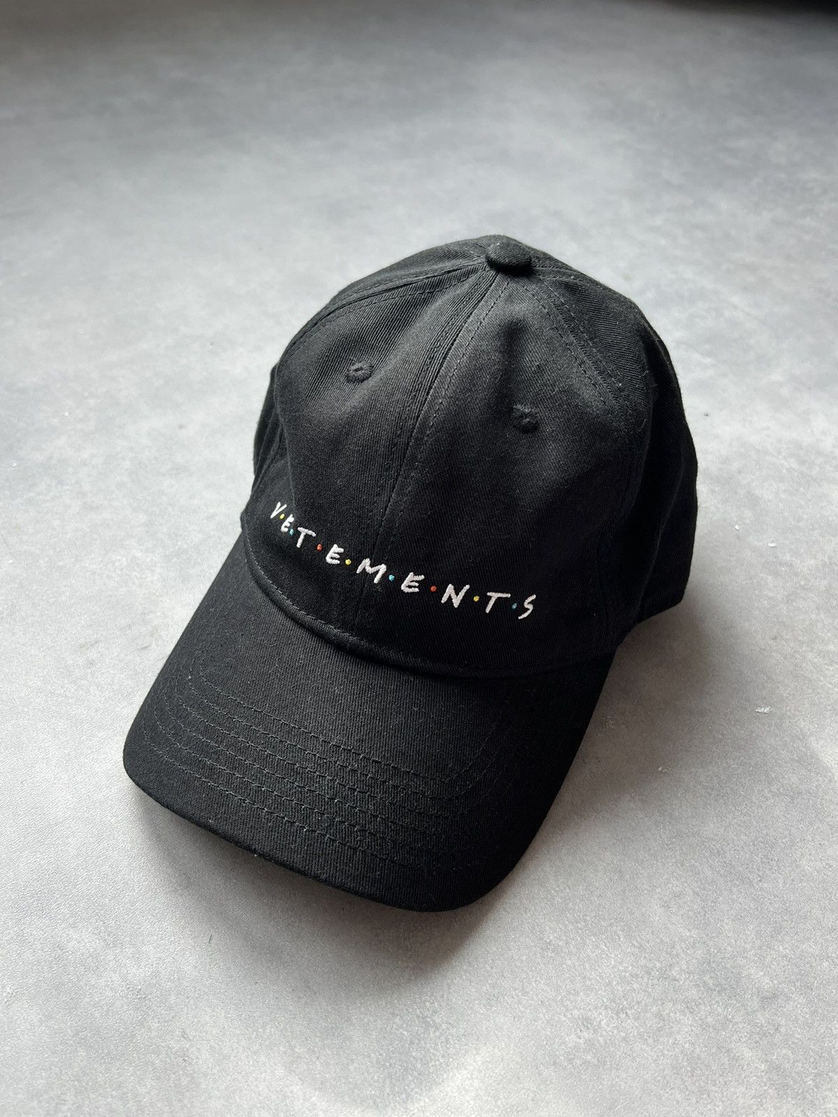 image of Vetements Friends Logo Hat in Black, Men's
