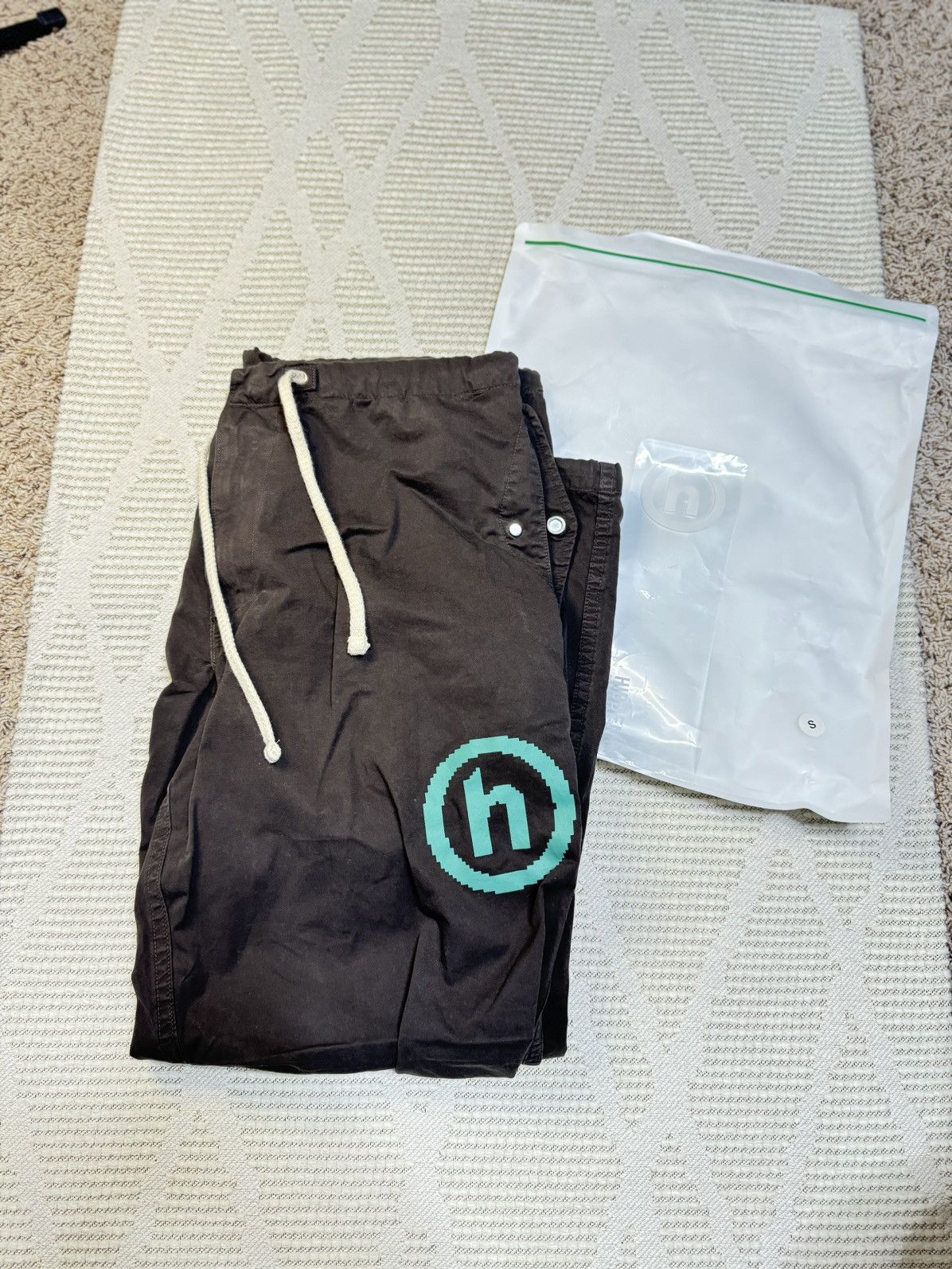 HIDDEN Hidden NY H logo pixelated over pants S/M | Grailed