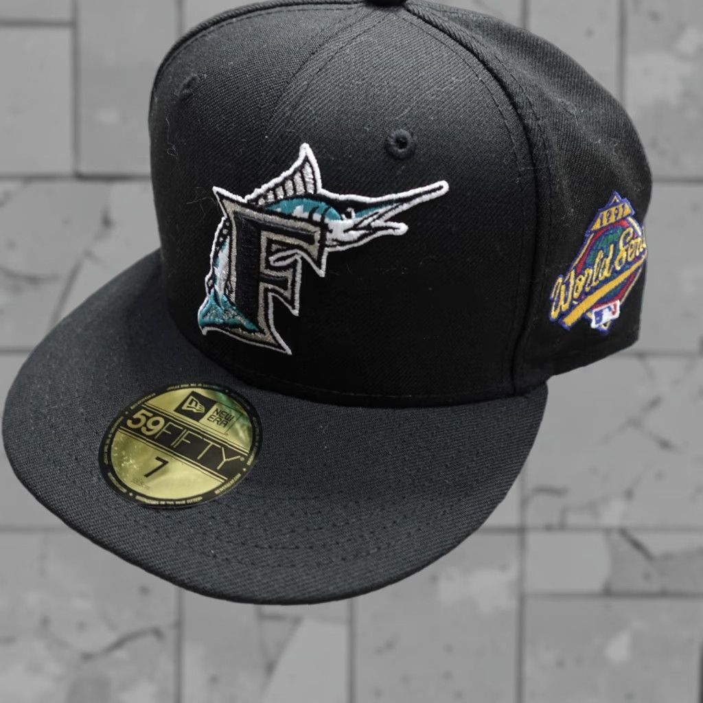 New Era VINTAGE Florida Marlins Hat Fitted 7 Black 100% Wool World Series 1997 Mens Wool Baseball Cap New Era 100% Wool Black Size 7 Size ONE SIZE - 1 Thumbnail