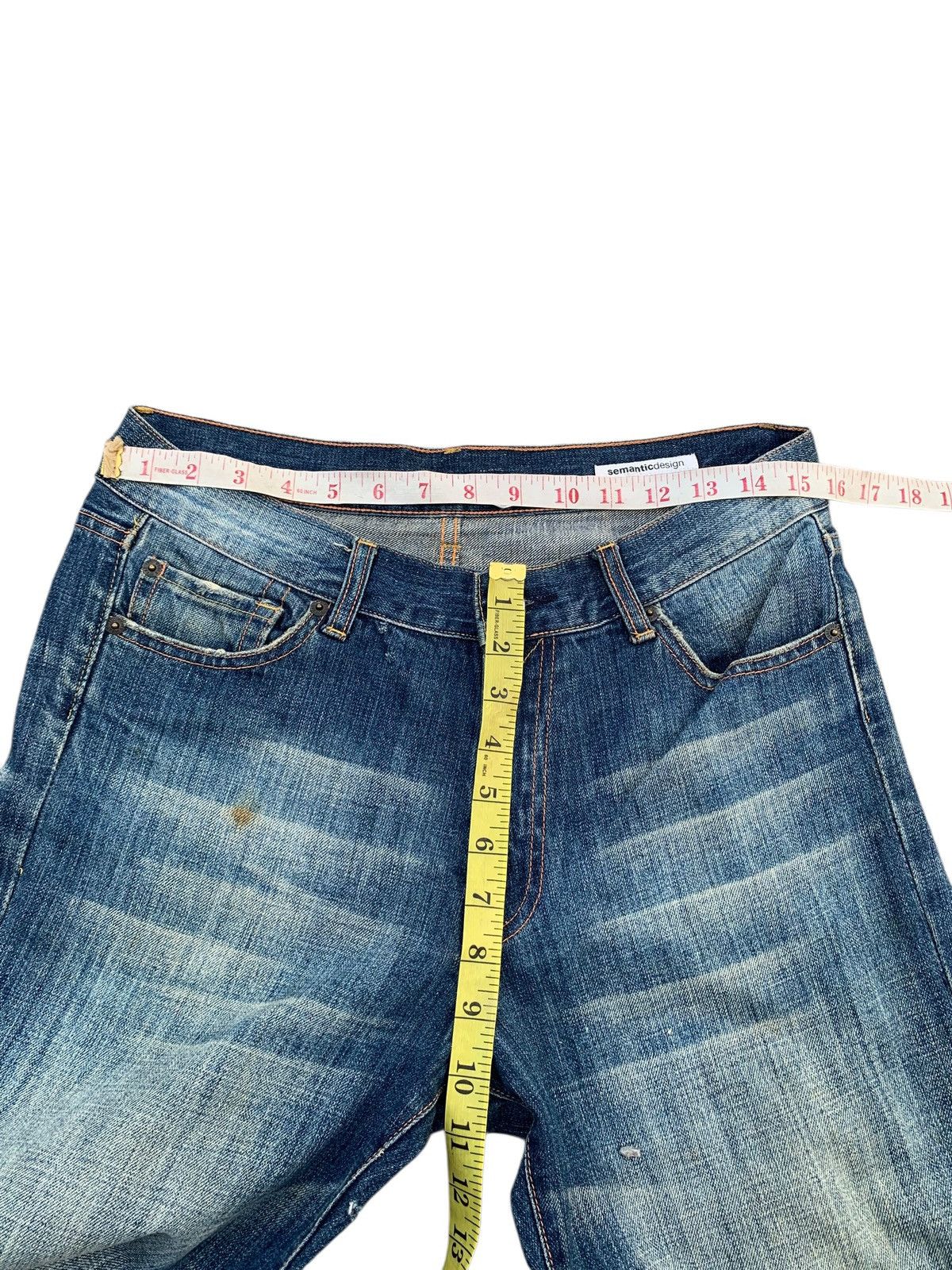 semanticdesign FLARE SEMANTIC DESIGN RUSTY JAPANESE DISTRESSED DENIM Size US 31 - 13 Thumbnail