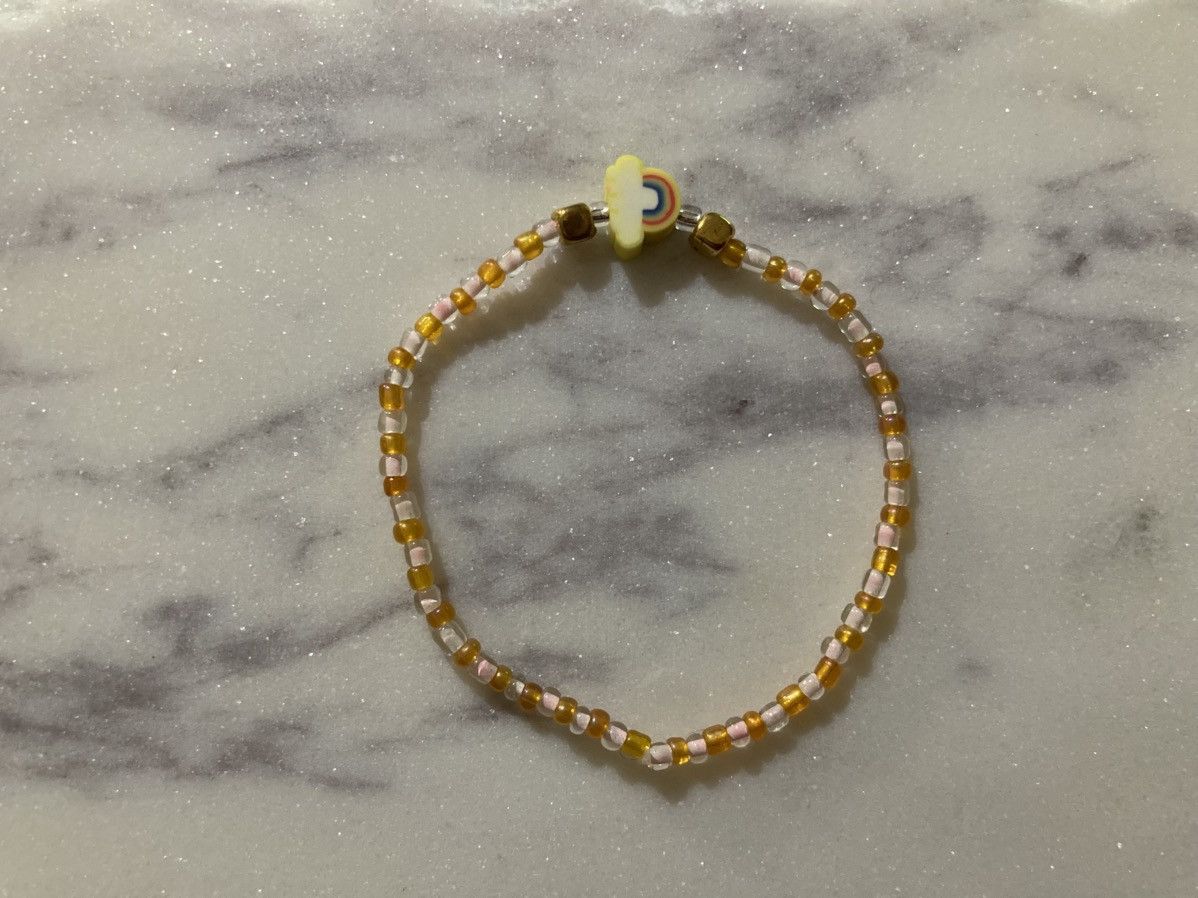 Other Rainbow bead and orange coloured bracelet Size ONE SIZE - 1 Preview
