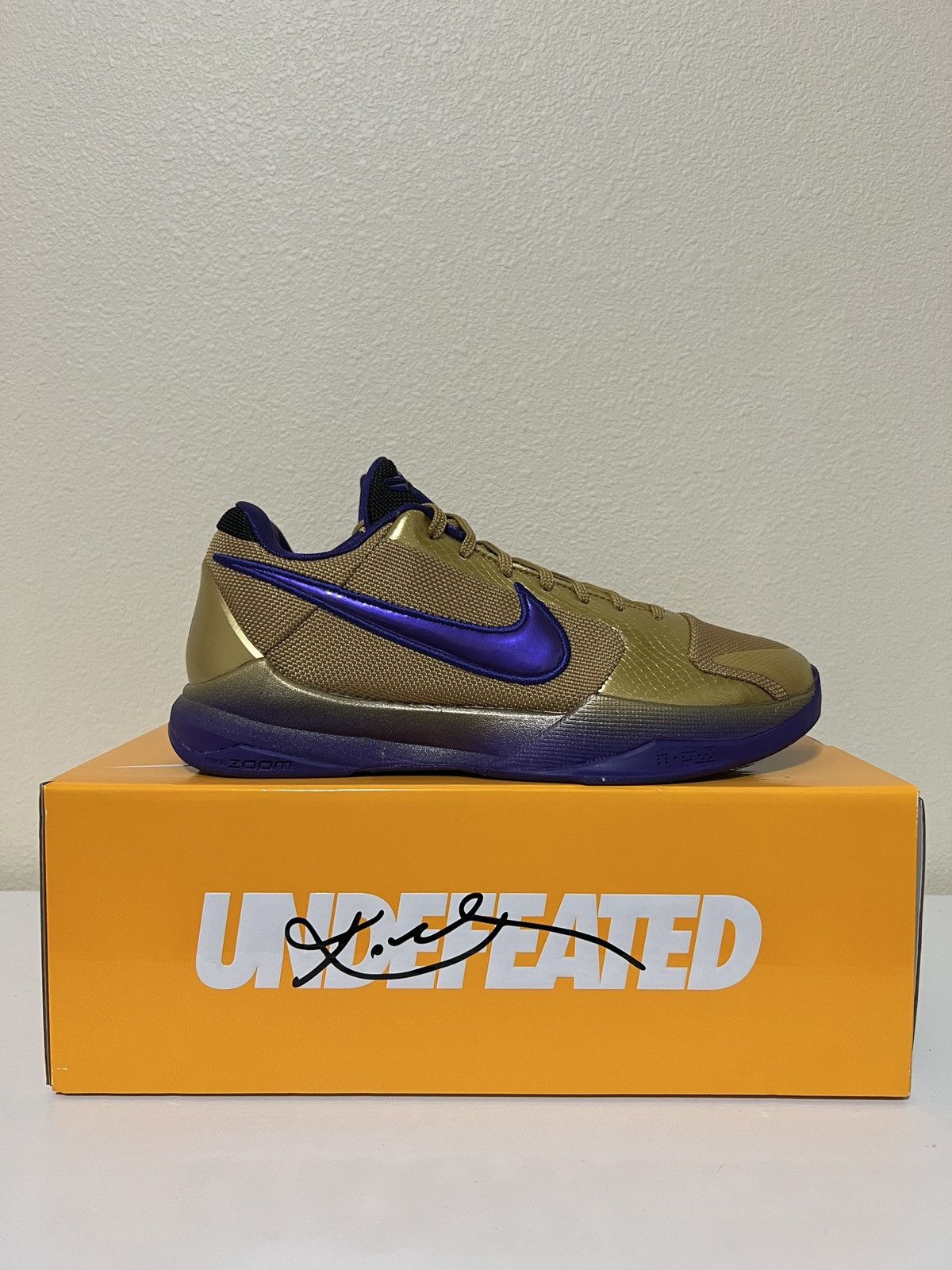 image of Kobe Mentality x Nike 2021 Nike Kobe X Undefeated 5 Protro Hall Of Fame Shoes in Gold (Size 8.5)