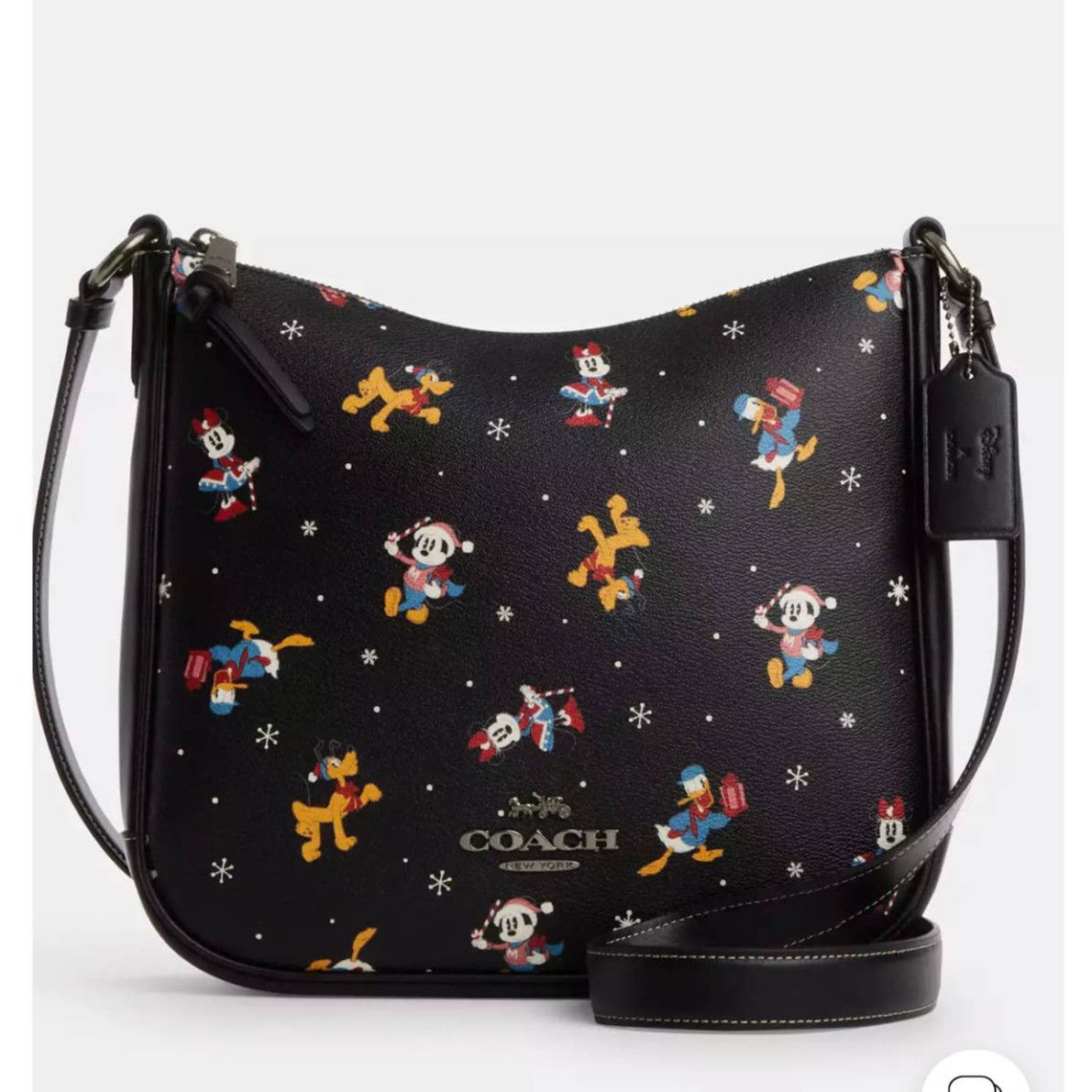 image of New Coach Disney X Coach Ellie File Bag With Holiday Print in Black, Women's