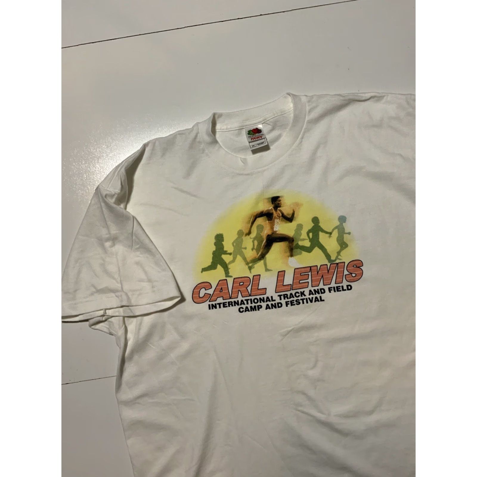 Fruit Of The Loom VINTAGE Carl Lewis International Track & Field Camp Festival Graphic T-Shirt 2XL Mens White Fruit of the Loom shirts? Size US XXL / EU 58 / 5 - 4 Thumbnail