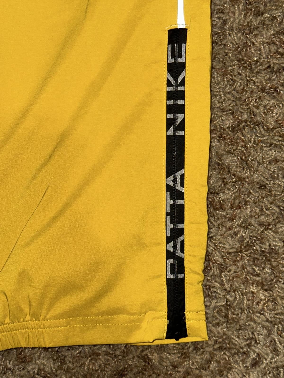 Nike Nike Men’s Patta Running Team Saffron Quartz Tracksuit Bottoms Size US 34 / EU 50 - 2 Thumbnail