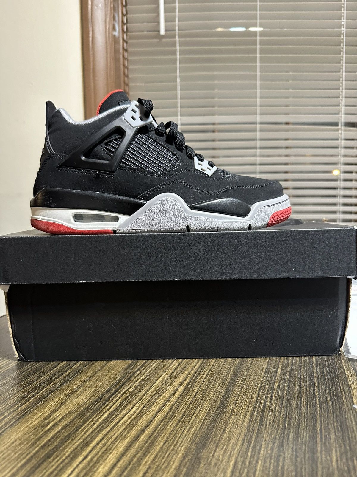 image of Bred 4’S Shoes in Black, Men's (Size 6)