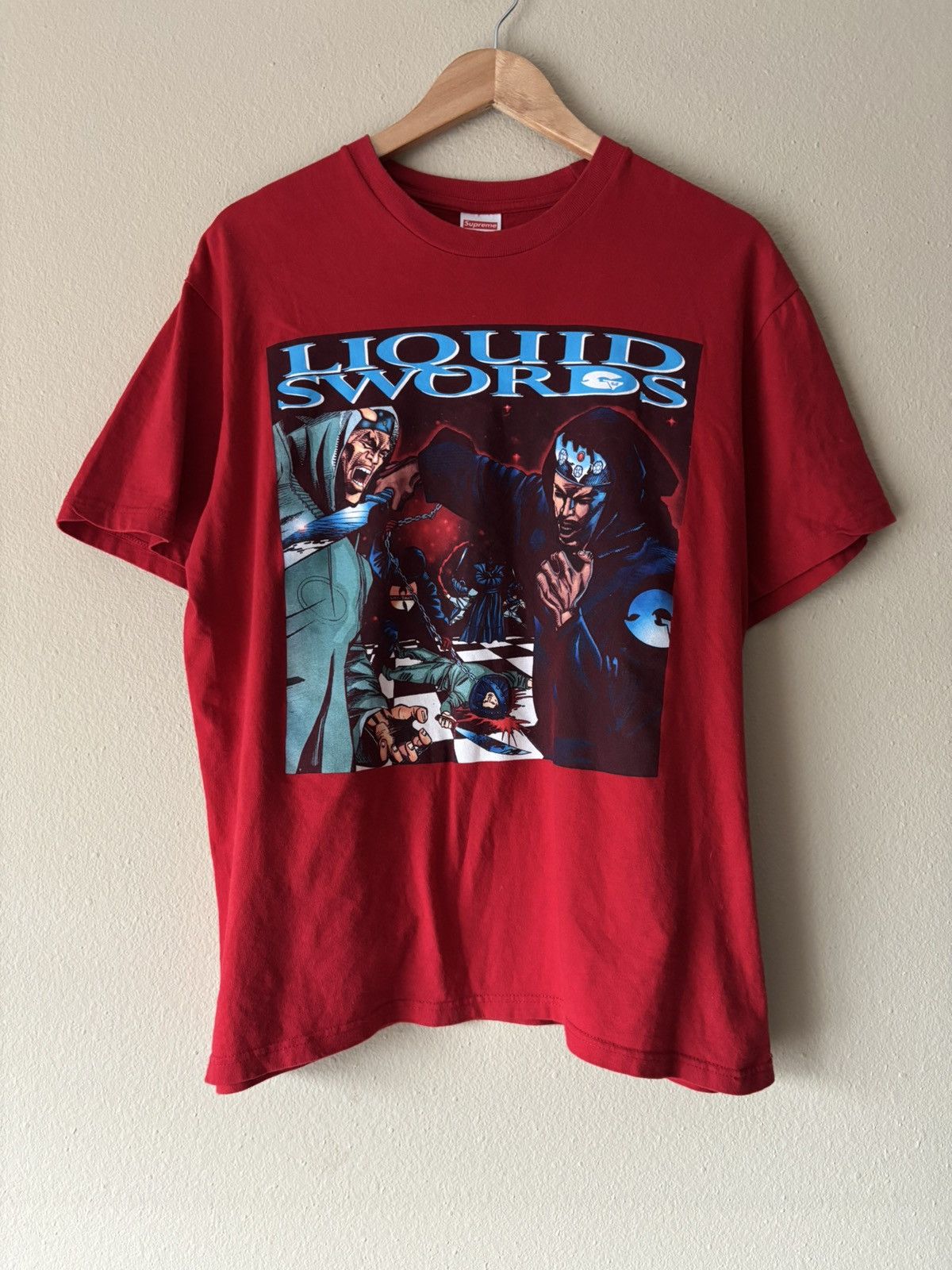Supreme “liquid swords” tee