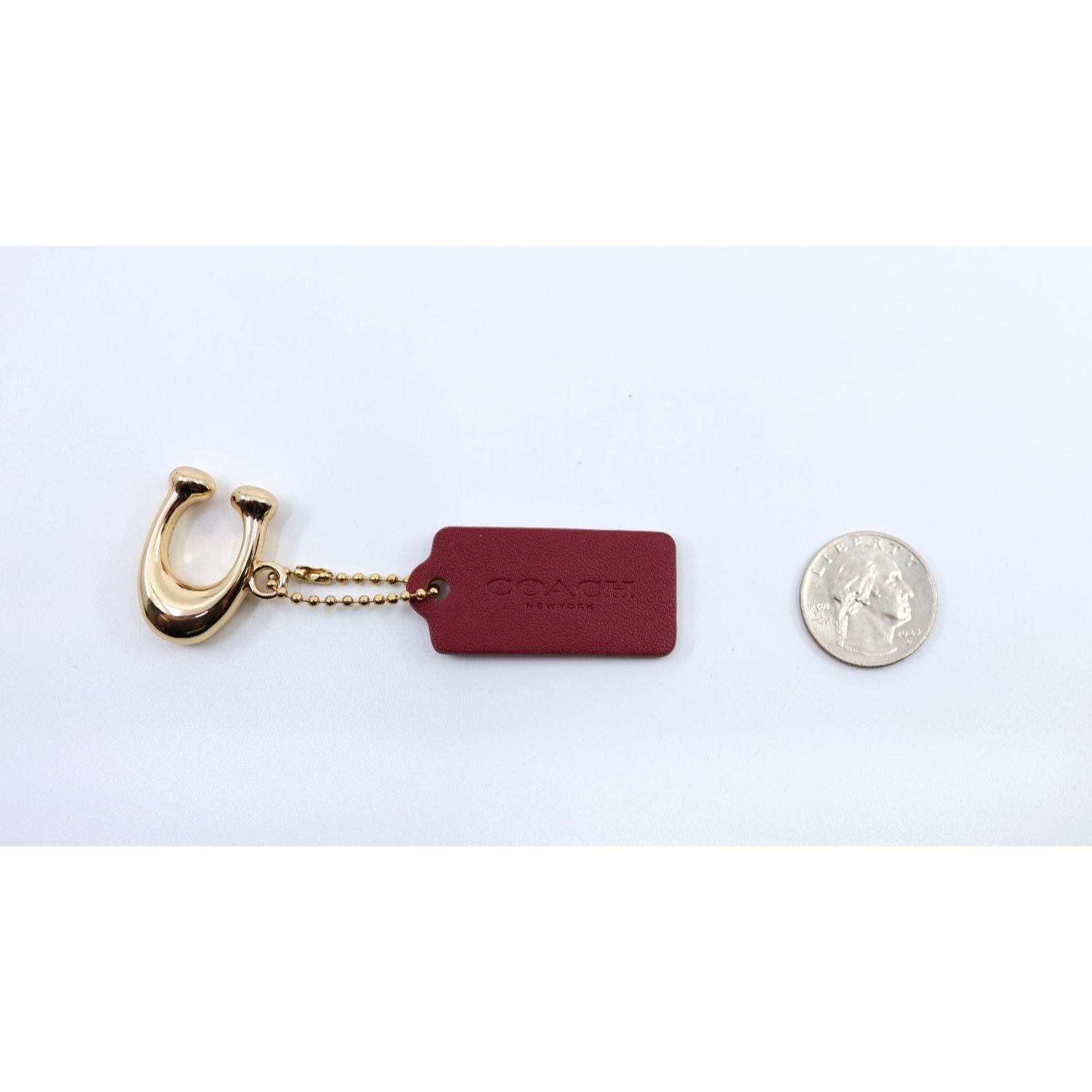 Coach NWoT COACH Burgundy Leather Hang Tag Gold Metal "C" Charm Size ONE SIZE - 1 Thumbnail