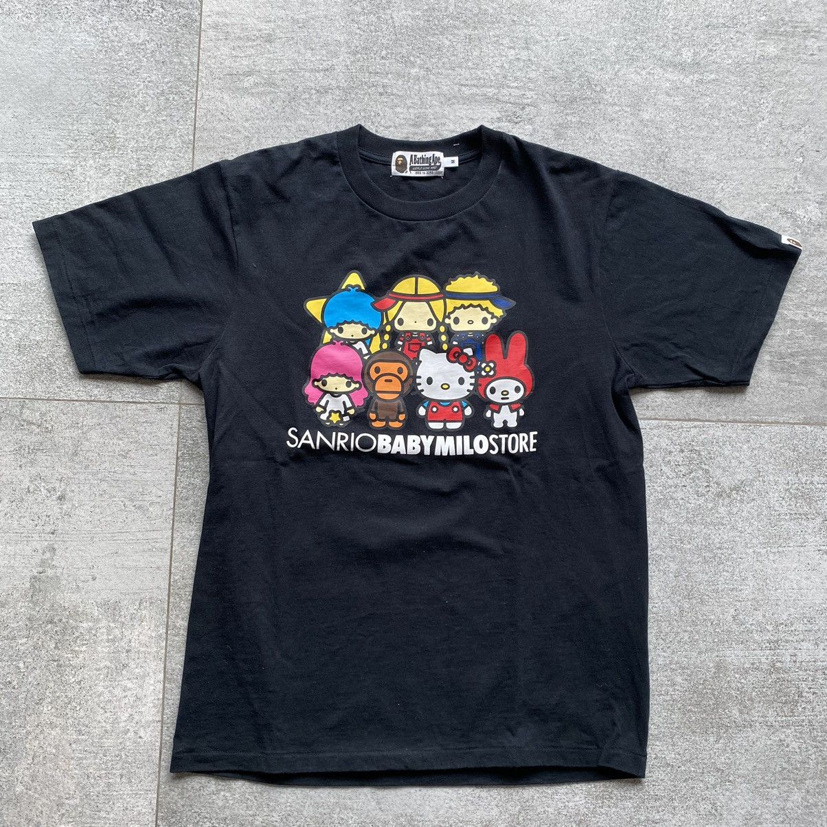 image of Baby Milo X Sanrio Little Twin Star Melody Hello Kitty Tee in Black, Men's (Size Medium)