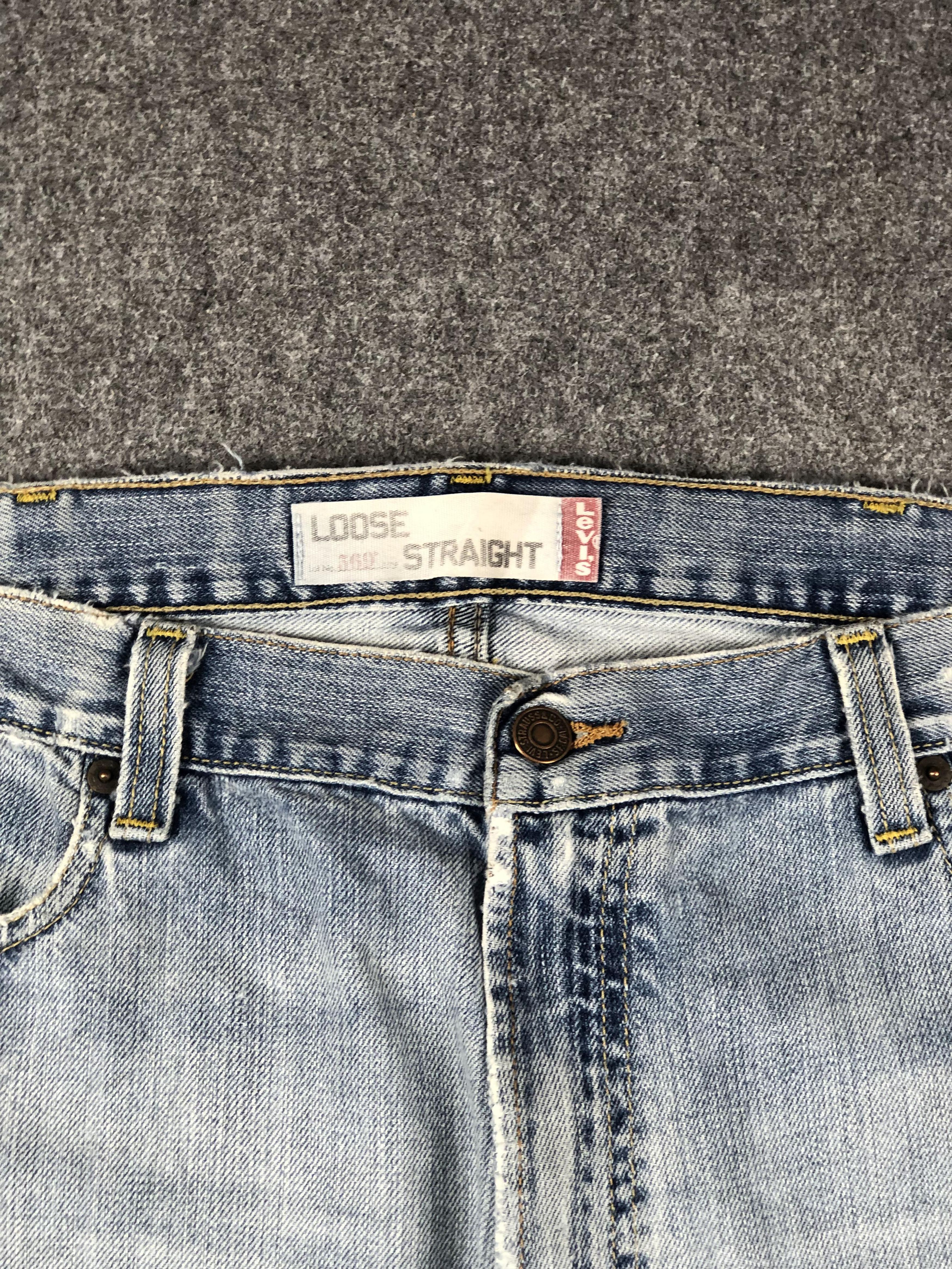 Vintage Disressed Levis 569 Light Wash Jeans DP2270