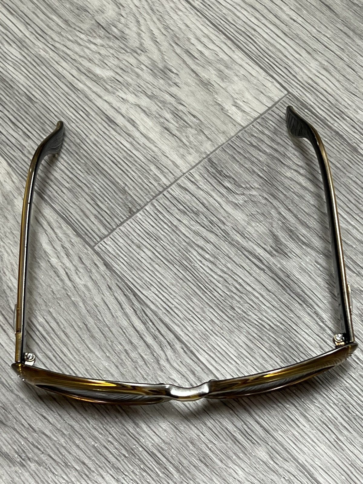 Vintage Gucci Vintage gold sunglasses with black inner temples Size ONE SIZE - 15 Thumbnail
