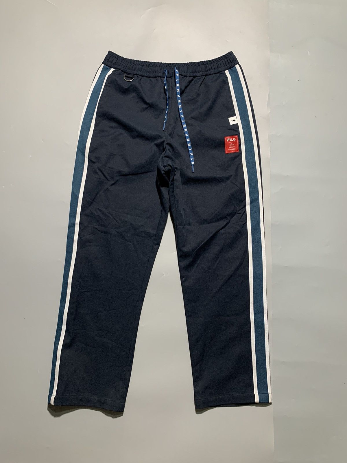 Fila × Maison MIHARA YASUHIRO FILA X MMY SIDE STRIPE WOVEN TRACK PANTS Size US 30 / EU 46 - 1 Thumbnail