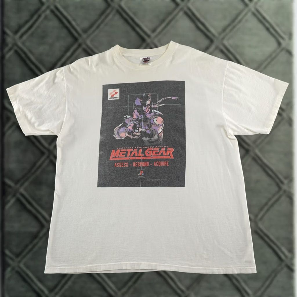 Vintage VINTAGE Power Pro Oneita Nike? Metal Gear Solid Mens XL T-Shirt White 23X28 1998 Shirts Mens XL White Metal Game Shirt Size US XL / EU 56 / 4 - 1 Thumbnail