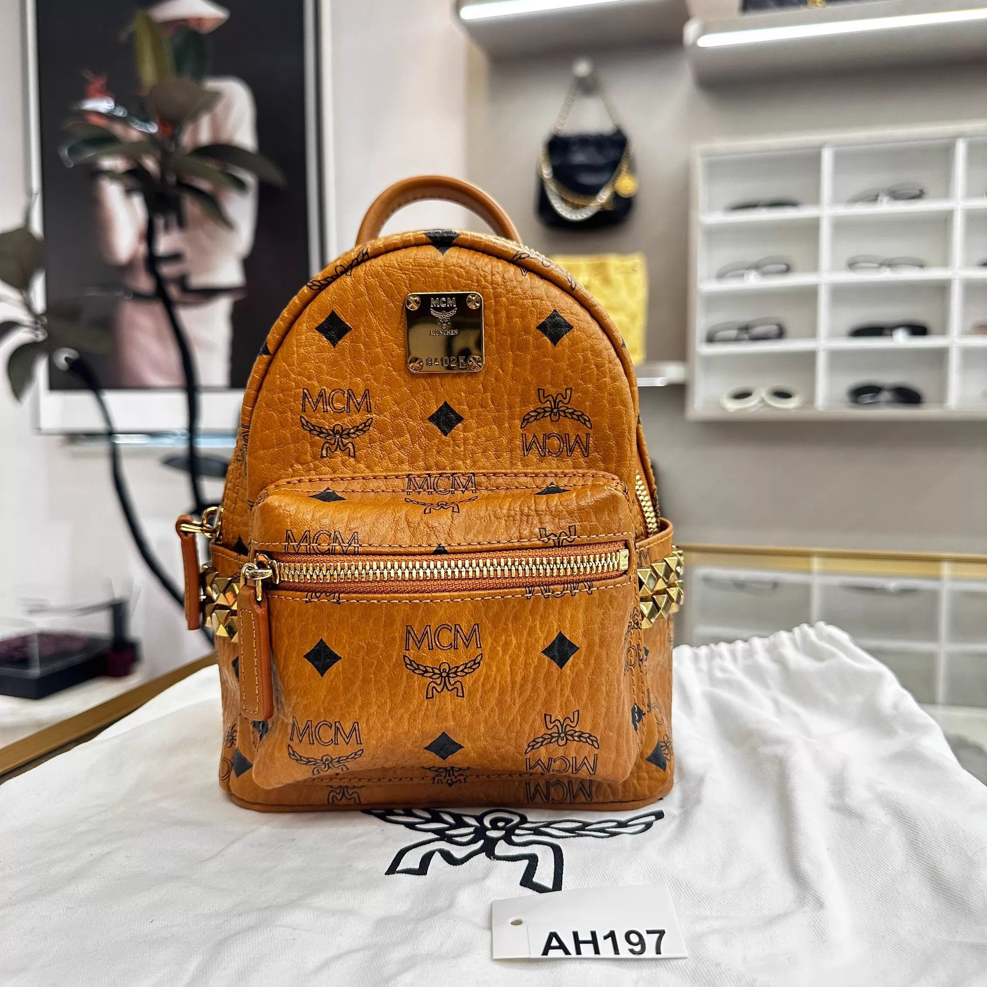 LIKE NEW Convertable MCM Backpack or Top Handle Bag Medium Stark Packable Backpack in Monogram Nylon Cognac  main image 3
