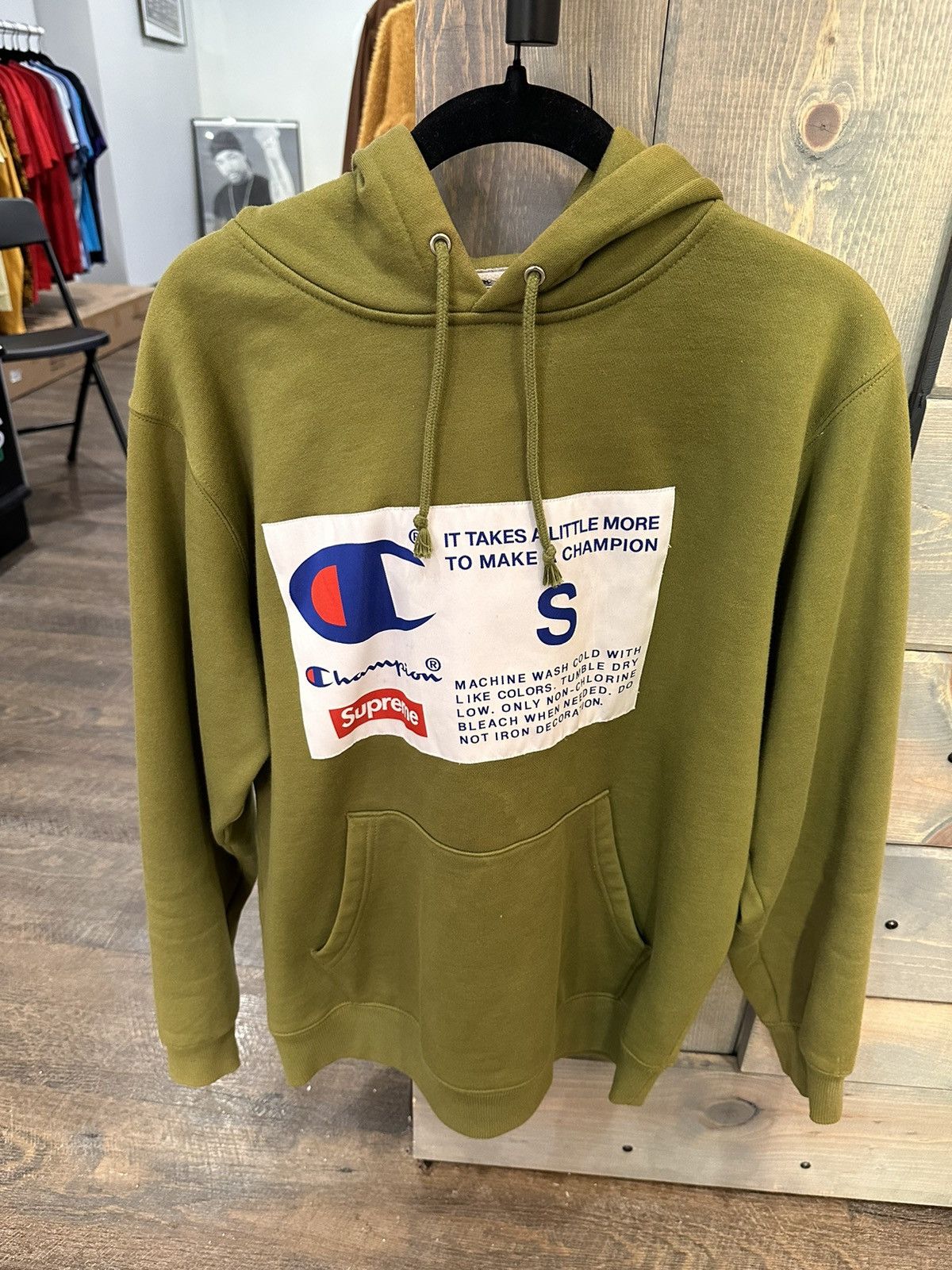 Supreme champion hoodie green on sale