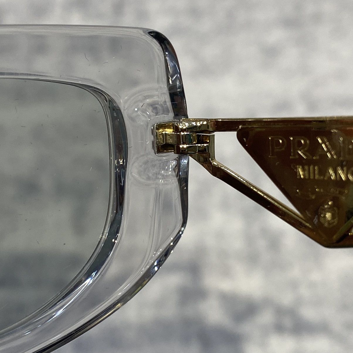 PRADA 0PR 14YS 12R50K TRANSPARENT GREY