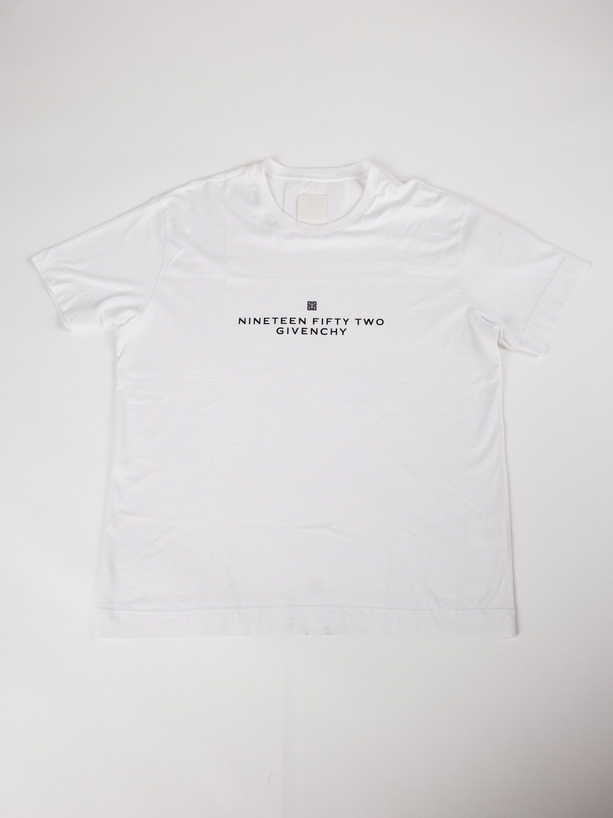 image of Givenchy 1952 Spell Out Logo Classic Fit Tee in White, Men's (Size 2XL)