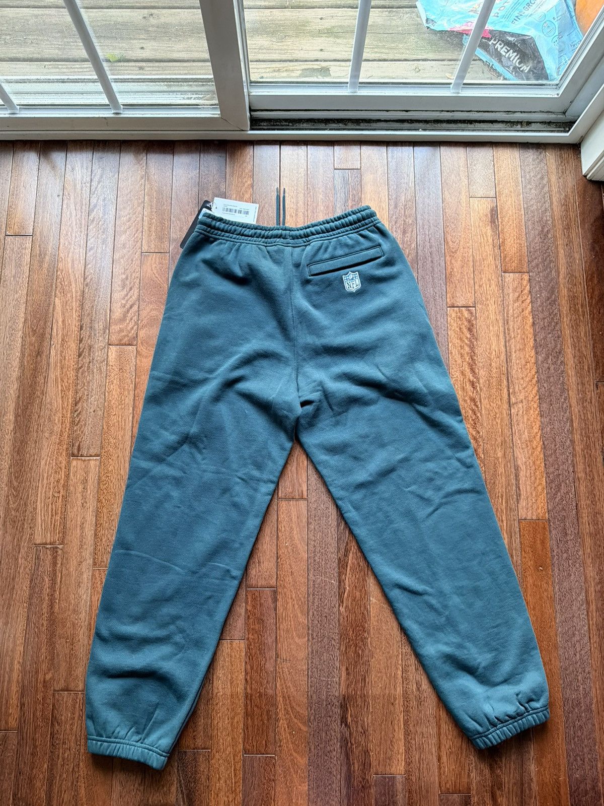 NFL × October's Very Own Octobers Very Own OVO NFL Eagles Sweatpants - midnight green Size US M / EU 48-50 / 2 - 5 Thumbnail