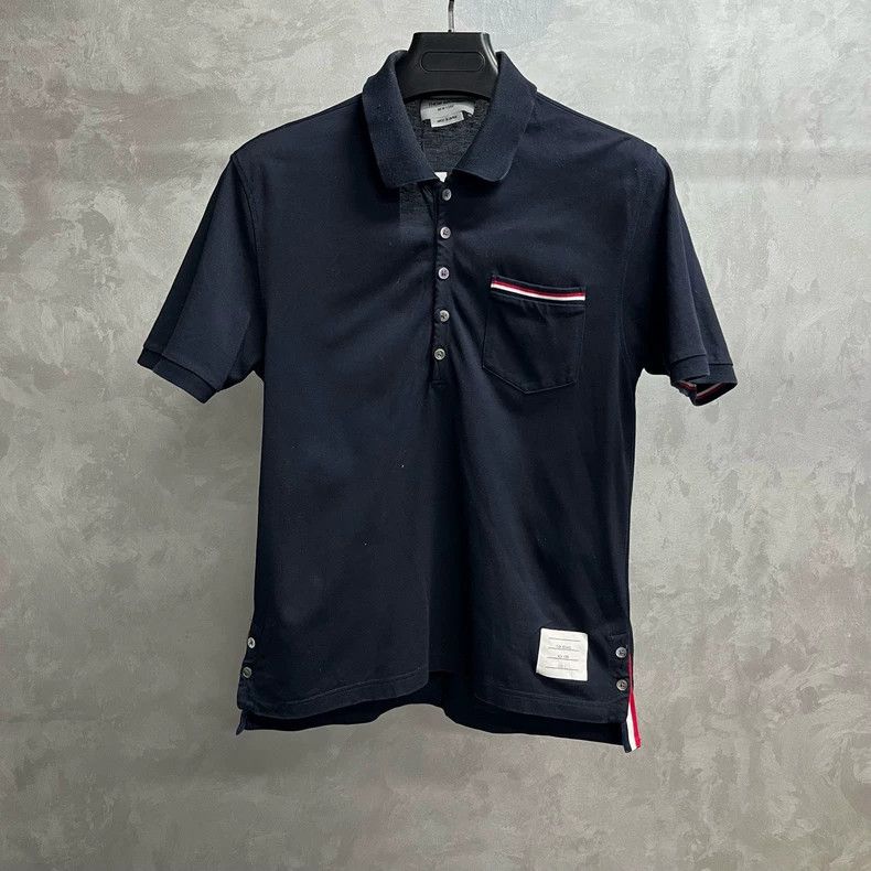 Thom browne Navy blue pocket striped solid color polo shir