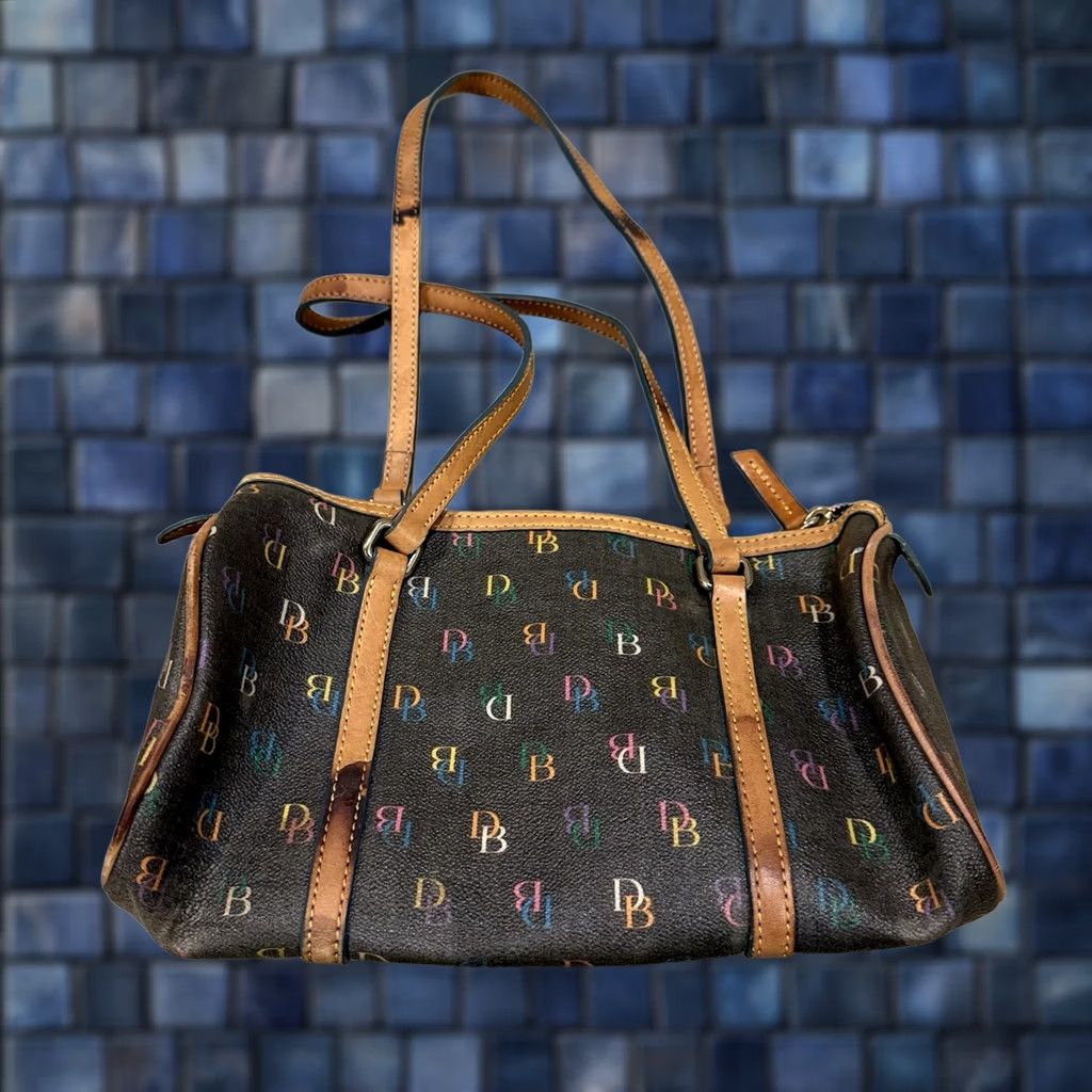 Dooney & Bourke VINTAGE Dooney & Bourke Barrel Bag Handbag Rainbow Signature DB Coated PVC Black Y2K Bag Shoulder Bag Womens Small Adjustable Strap Size S / US 4 / IT 40 - 1 Thumbnail