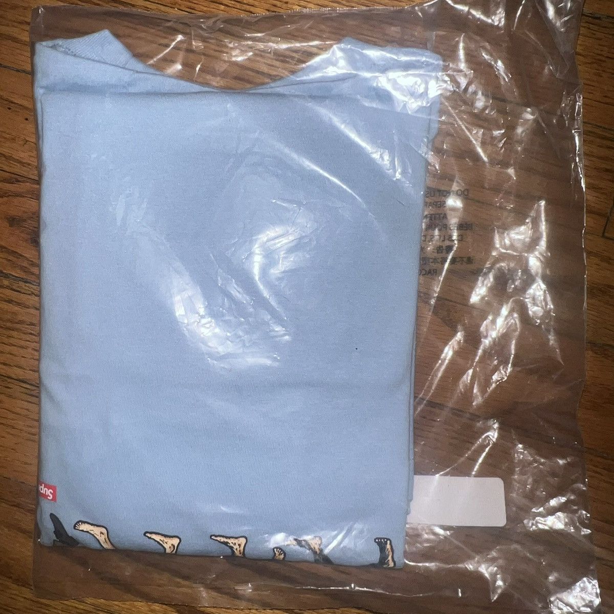 Supreme In-Hand Supreme Evolution Tee Powder Blue Size: Large Size US L / EU 52-54 / 3 - 5 Thumbnail