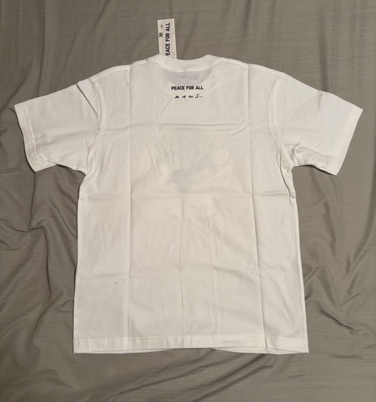 Kaws × Uniqlo Kaws X Uniqlo “Peace For All” T-Shirt (Japan Sizing) Size US S / EU 44-46 / 1 - 2 Thumbnail