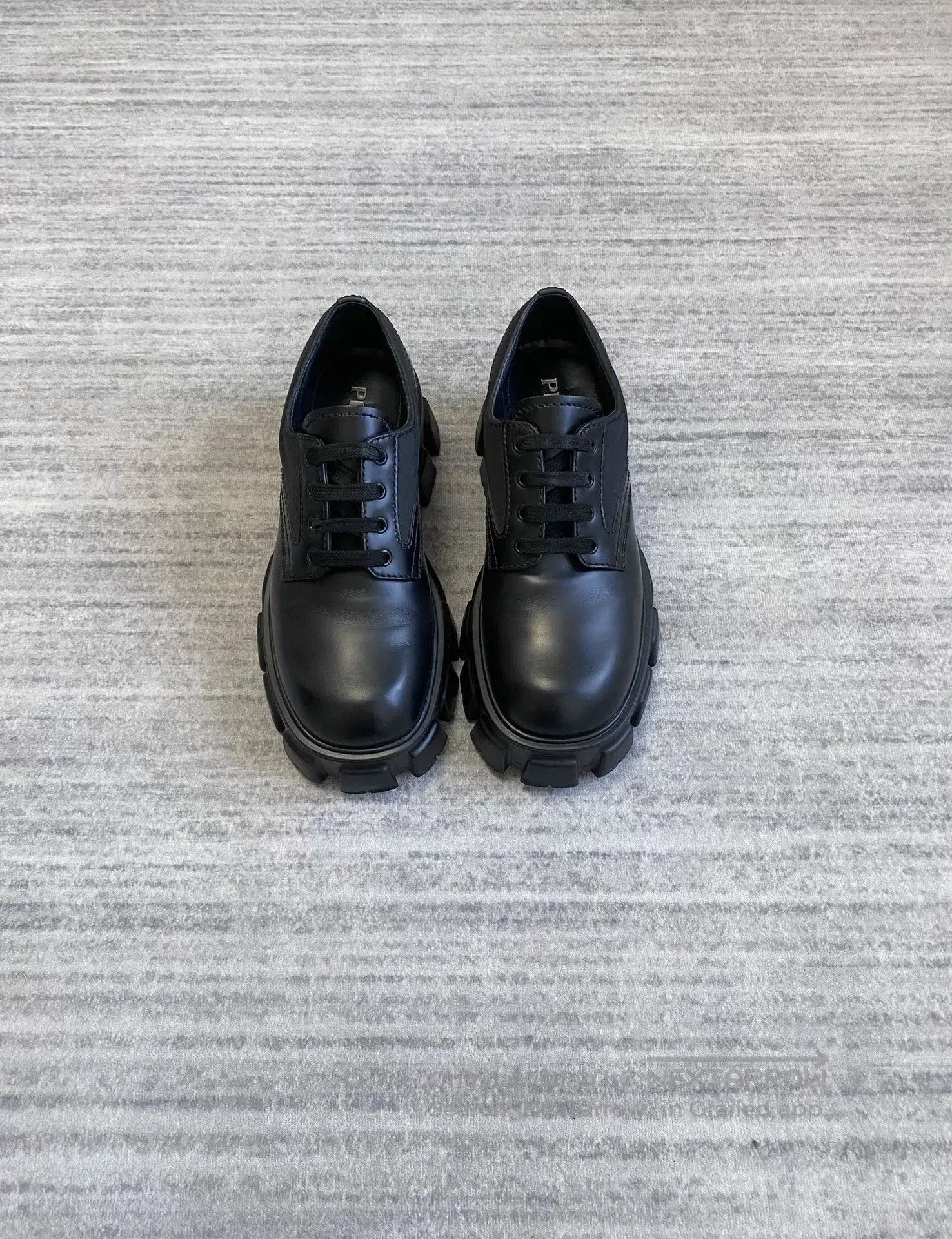 prada monolith thick-soled derby shoes.