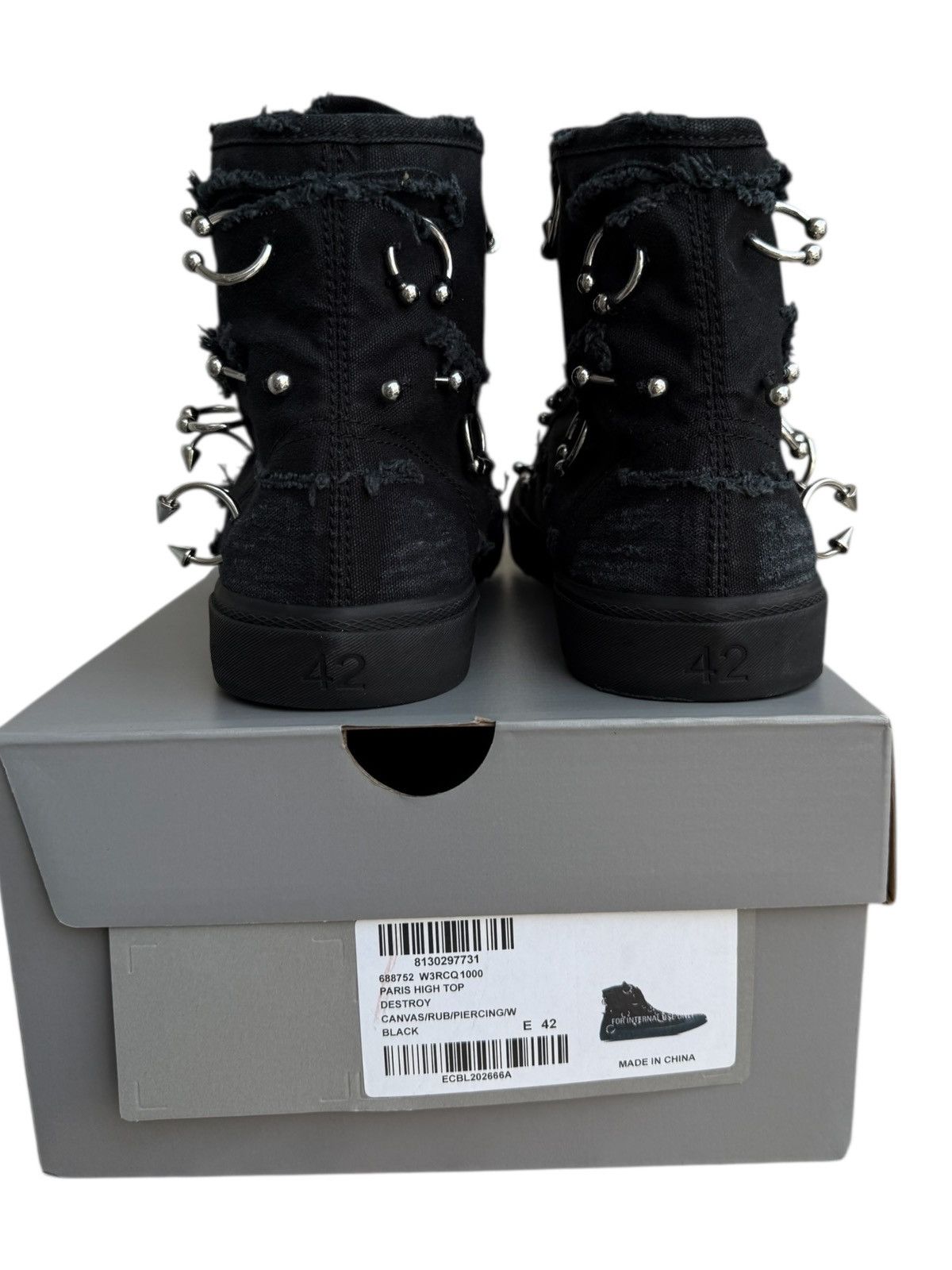 Balenciaga pierced hightop sneakers - threedaughtersproperties.com