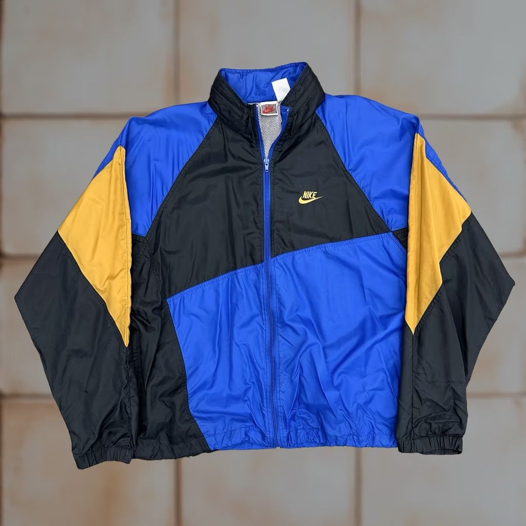 Nike VINTAGE Nike Geometric Blue Black Gold Windbreaker Jacket Nylon XL Mens Regular Windbreaker Fully Zip Hooded 90s Logo Embroidered Spring Summer Winter Size US XL / EU 56 / 4 - 1 Thumbnail