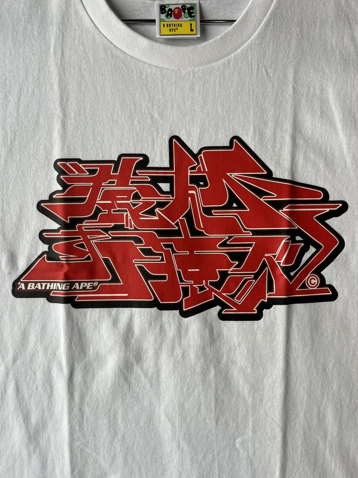 Bape BRAND NEW BAPE ASNKA KANJI GRAFFITI LOGO TEE WHITE/RED LARGE Size US L / EU 52-54 / 3 - 4 Thumbnail