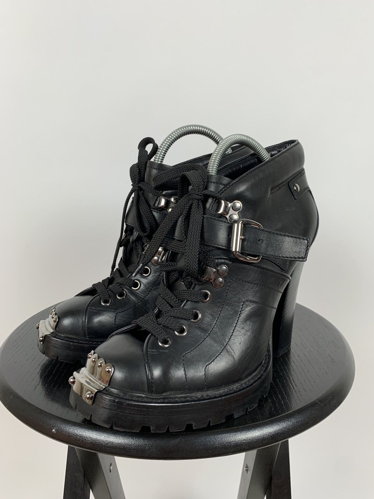 Miu Miu Black Leather Metal Plated Belted Heel Ankle Boots