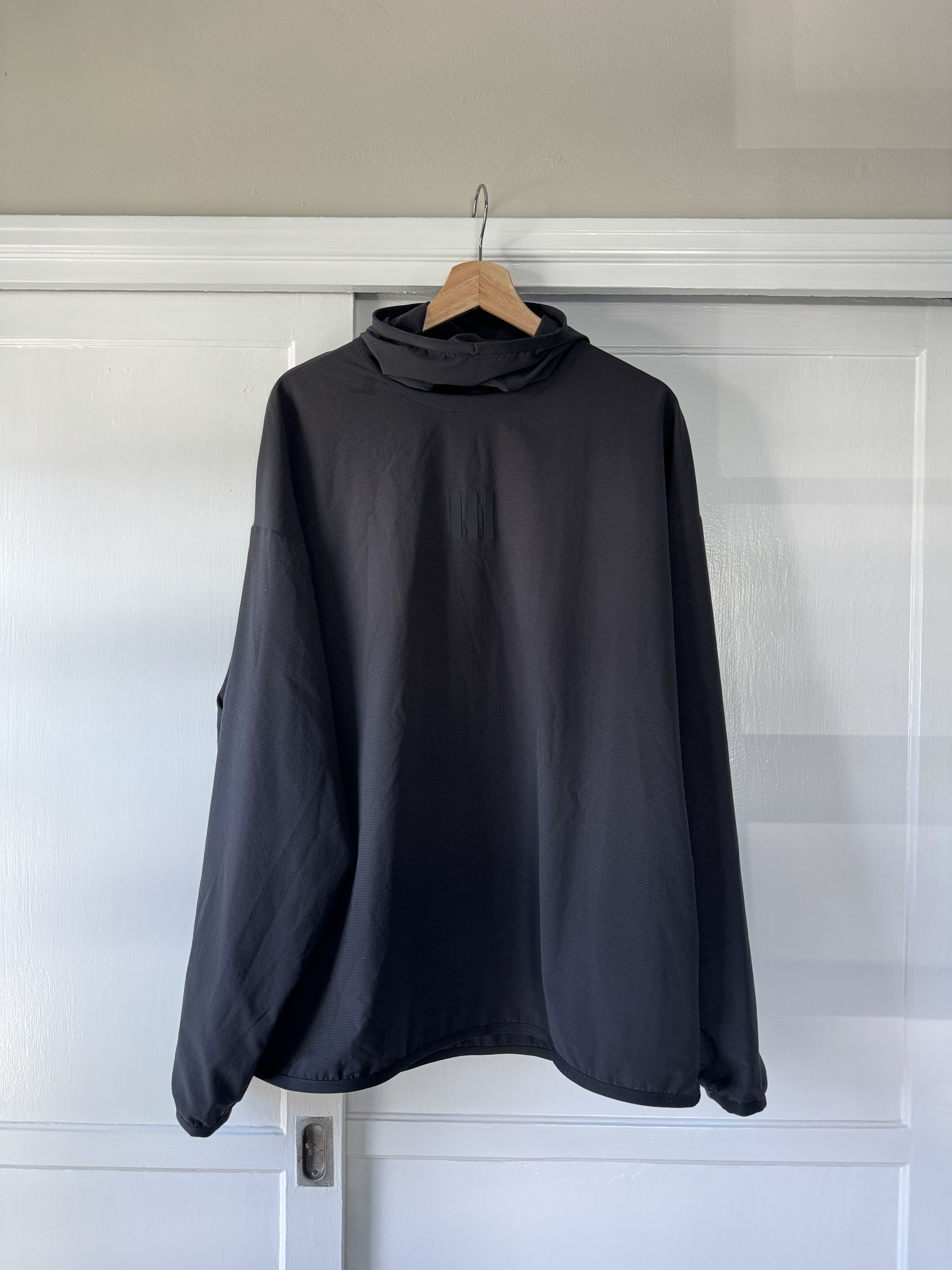 image of Adidas x Fear Of God Athletics Stretch Woven Running Hoodie in Black, Men's (Size Small)