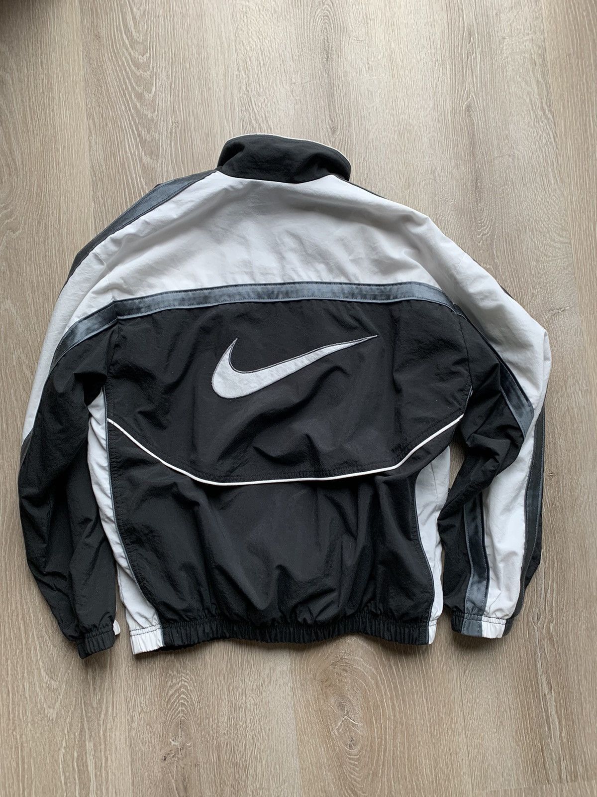 image of Y2K 90's Big Swoosh Nike Track Jacket in Black, Men's (Size Medium)