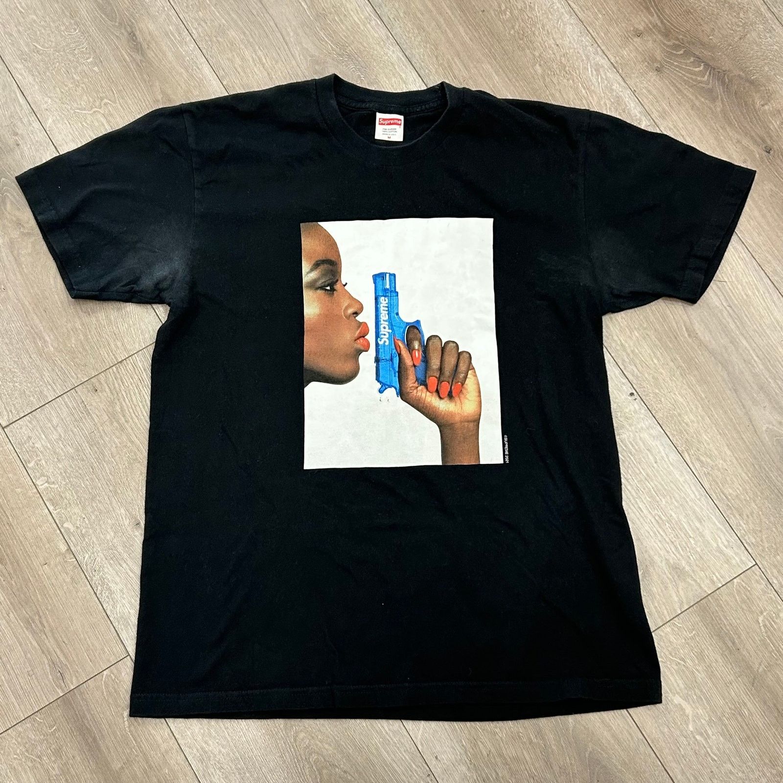 Supreme Supreme Water Pistol Tee | Grailed