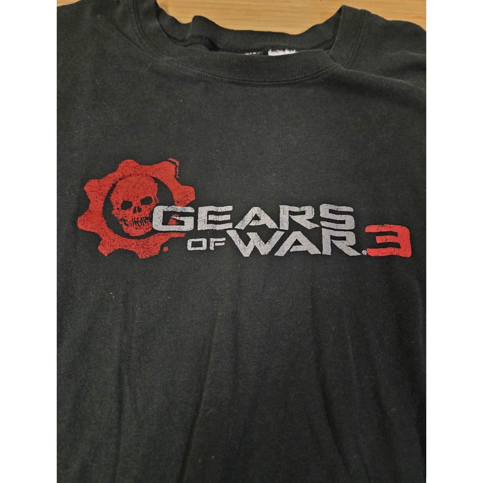 Vintage **Gears of War 3 Mens Black Graphic Tee XL Cog Logo** User: **Gears of War 3 Mens Black Graphic Tee XL Cog Logo** Size US XL / EU 56 / 4 - 2 Thumbnail