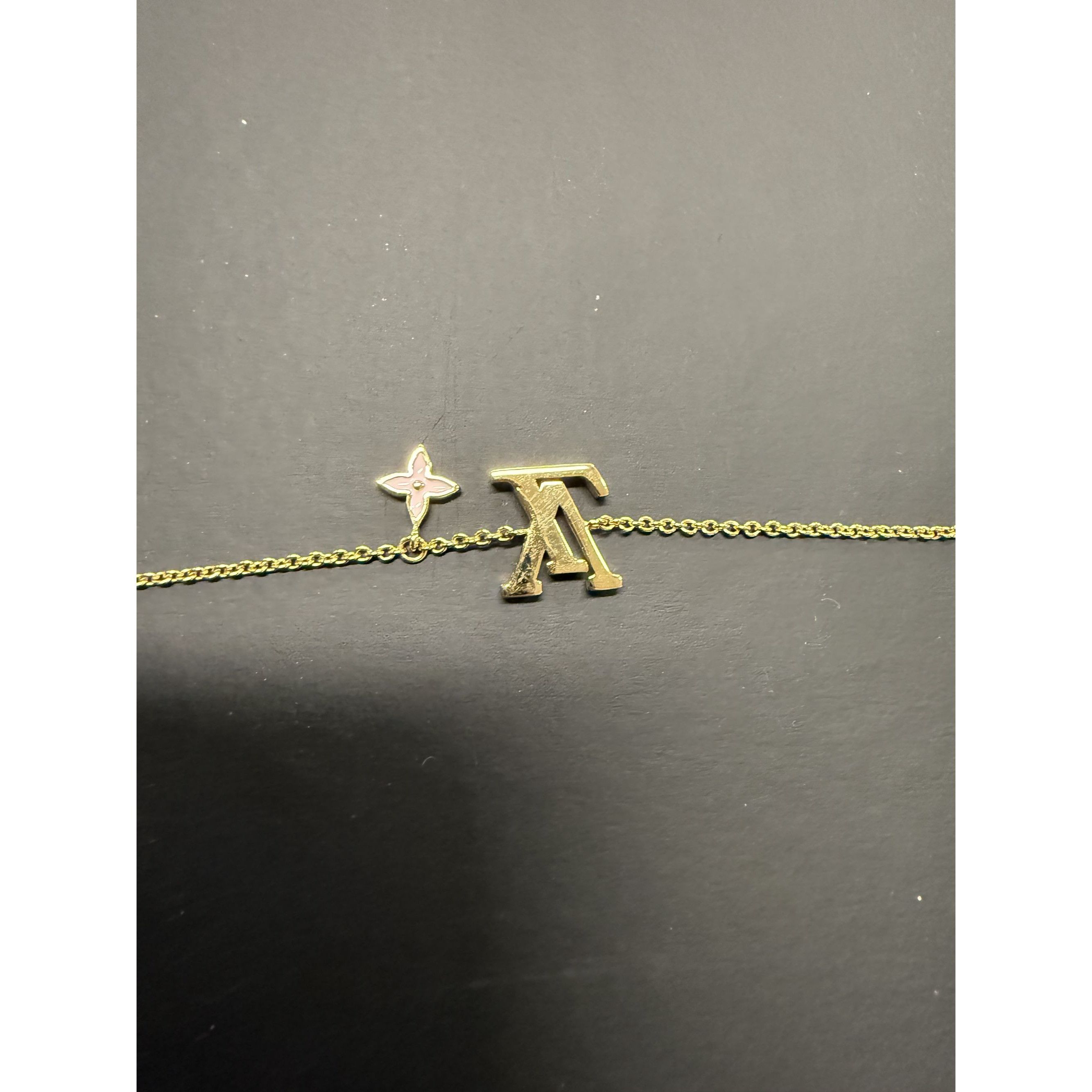 Louis Vuitton Louis Vuitton Gold-Tone Bracelet With LV Logo & Flower Charm Size ONE SIZE - 2 Thumbnail