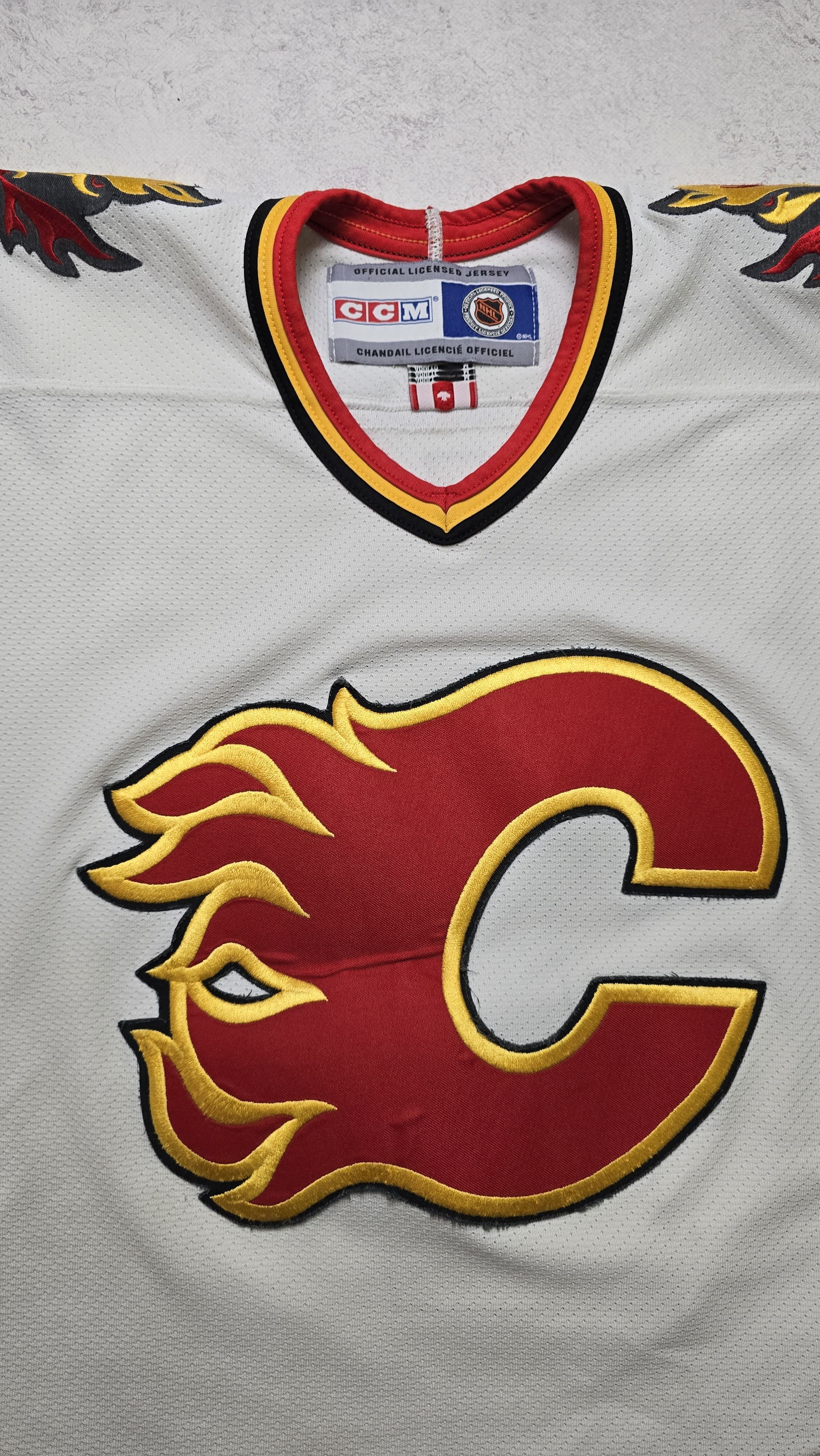 Ccm VTG CCM Air-Knit Calgary Flames Dolan #1 NHL Hockey Jersey Size US M / EU 48-50 / 2 - 13 Thumbnail