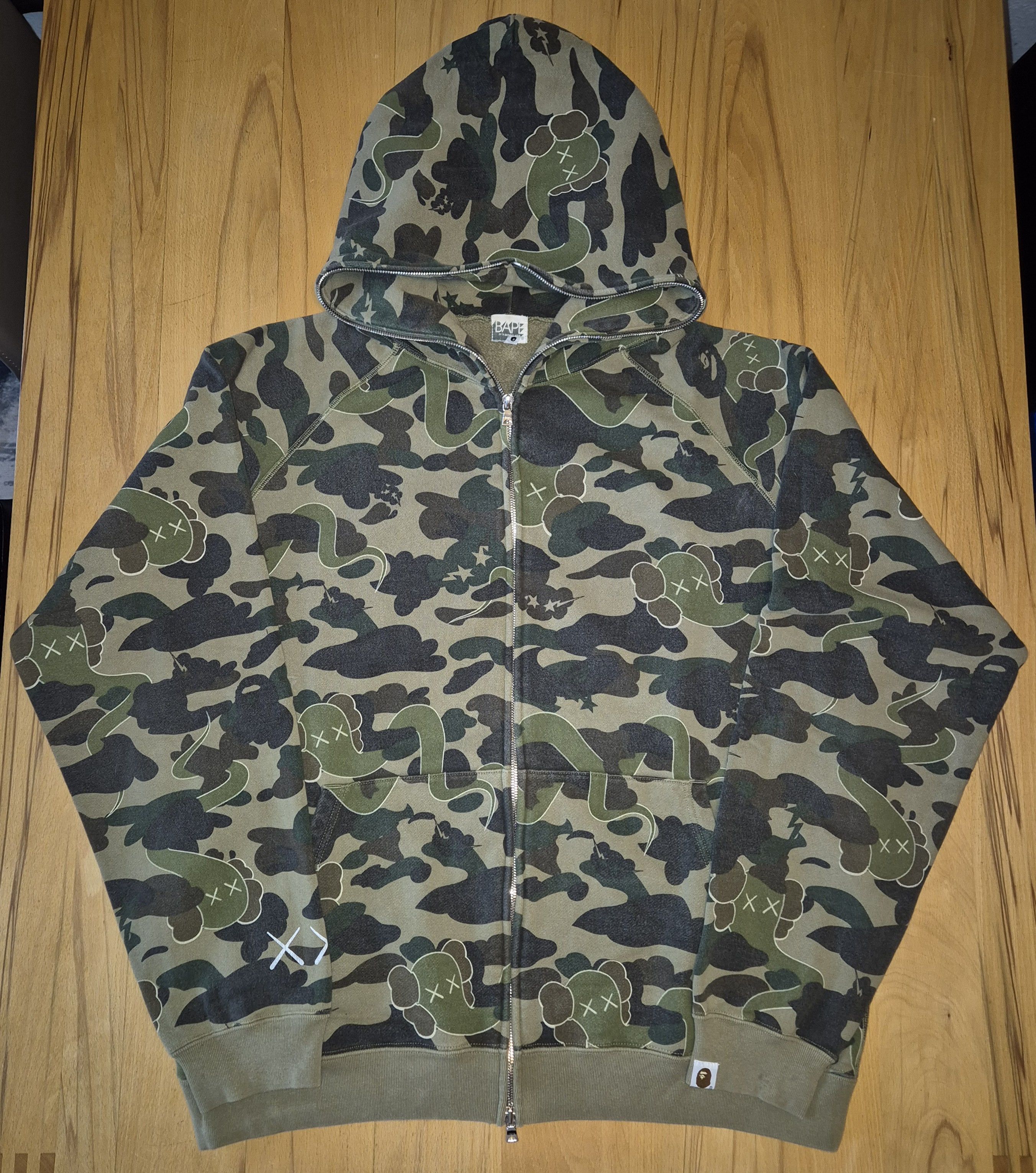 Bape × Kaws Bape x Kaws 1st Camo Bendy Full Zip Hoodie | Grailed