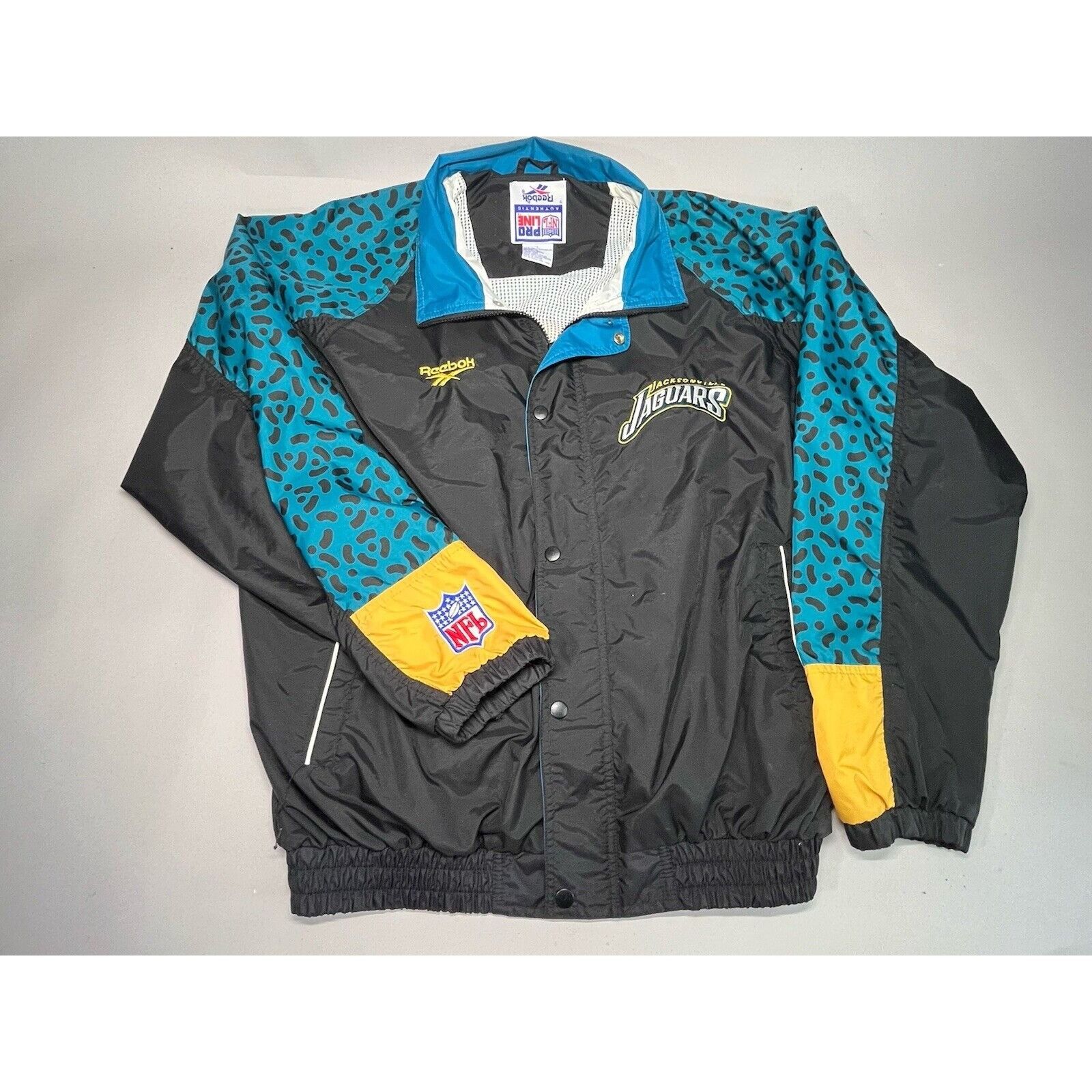 Vintage 90s Reebok NFL Pro Line Windbreaker Jacket Jacksonvi