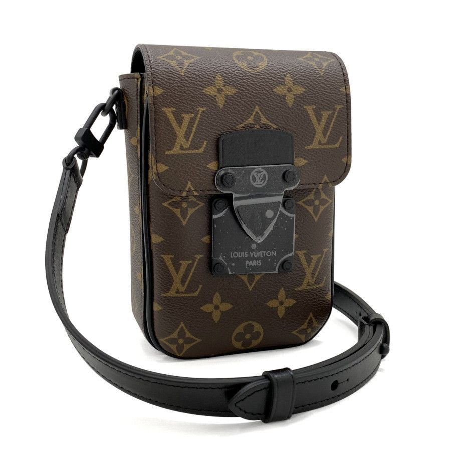 Louis Vuittons Lock Vertical Wearable Wallet Noir Black Shoulder Bag