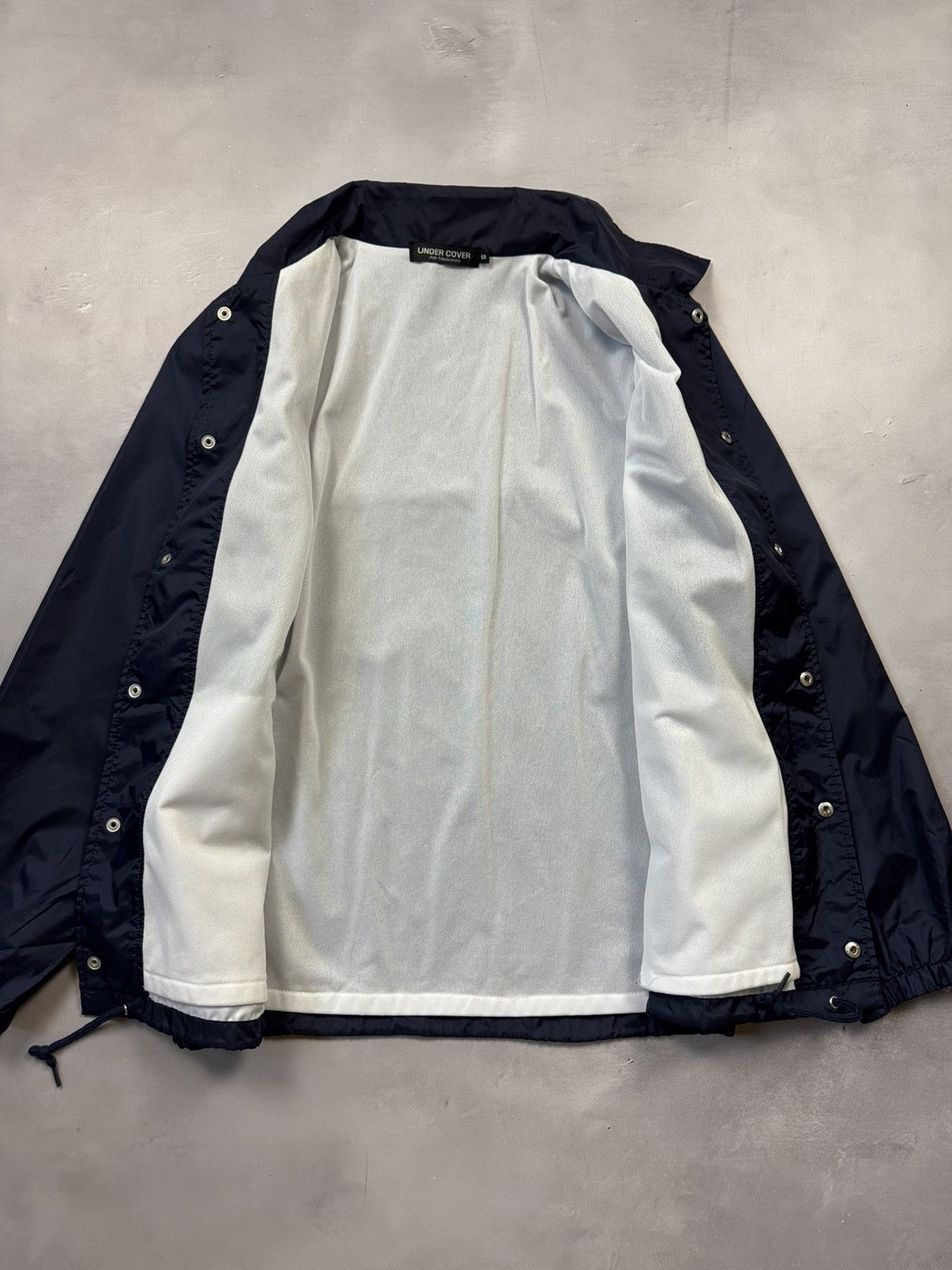 Undercover Undercover Madstore Logo Coach Jacket(Navy/S) Size US S / EU 44-46 / 1 - 6 Thumbnail