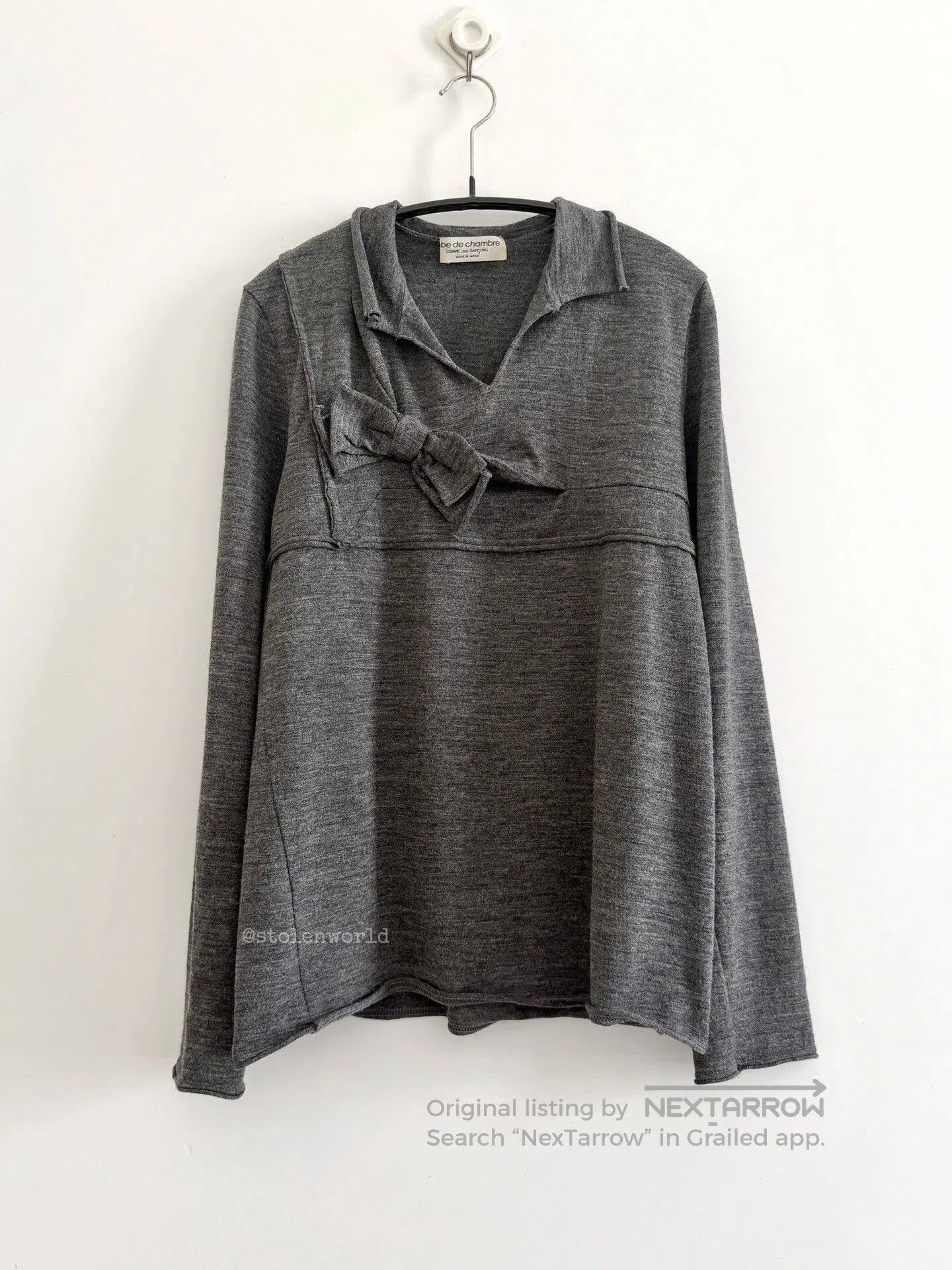 gray wool top with bow detail.