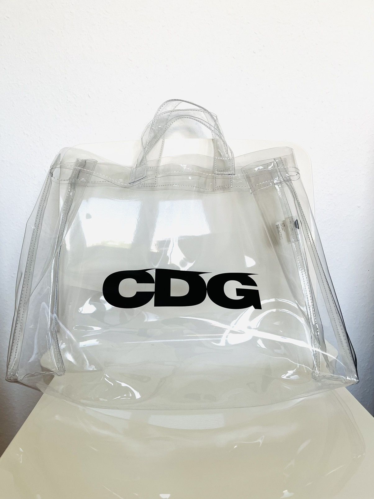 image of Comme Des Garcons Transparent Pvc Tote Bag in Transparent White, Men's