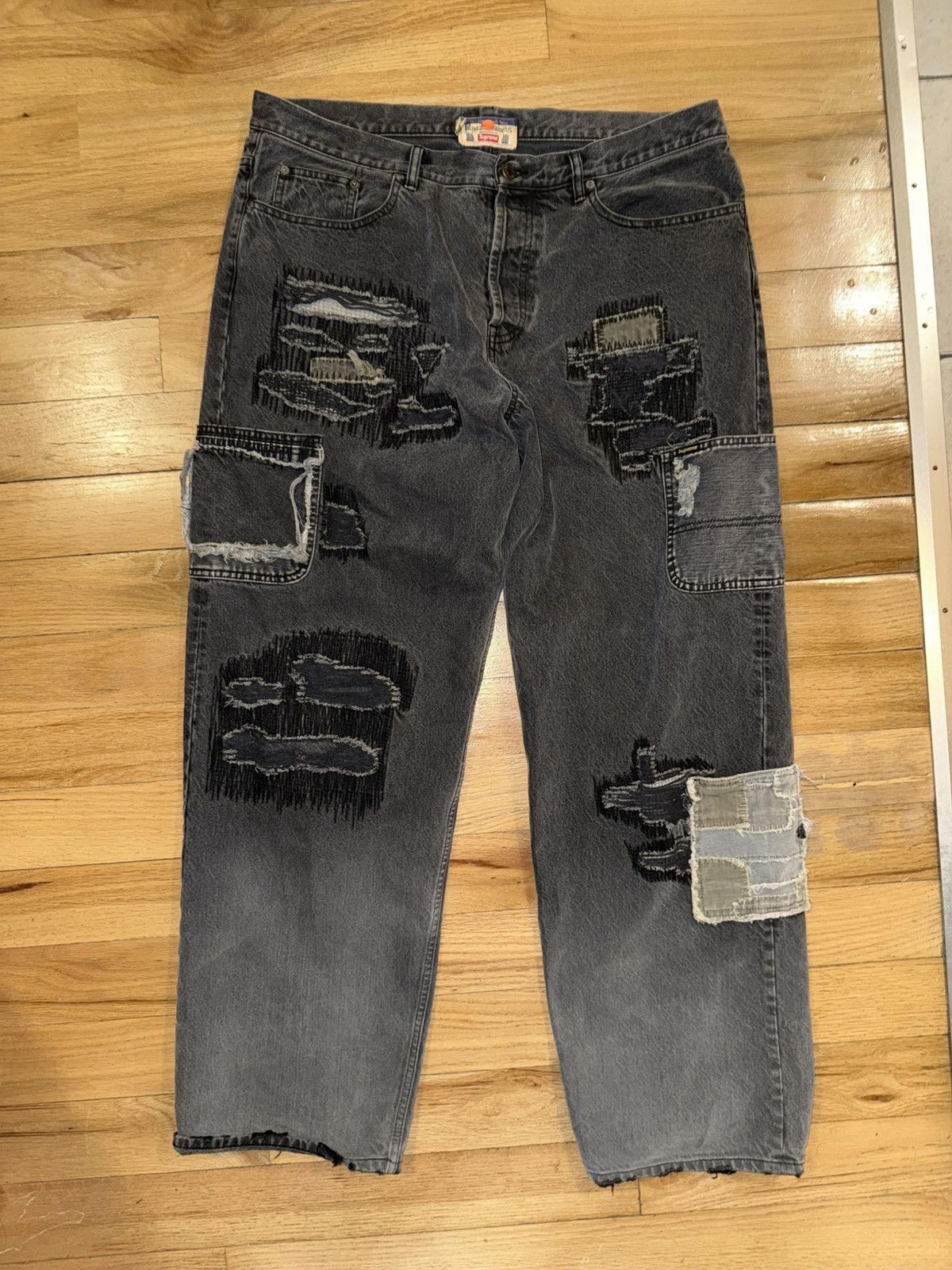 Supreme®/blackmeans Loose Fit Jean Supreme blackmeans Mended Loose Fit Jean (FW23) - $398