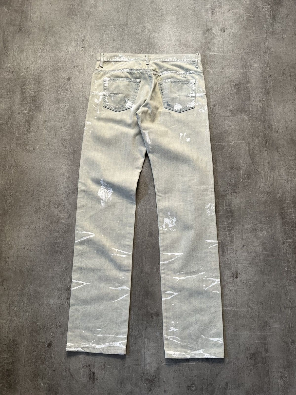 Dior × Hedi Slimane Dior Homme white paint splatter jeans by Hedi 