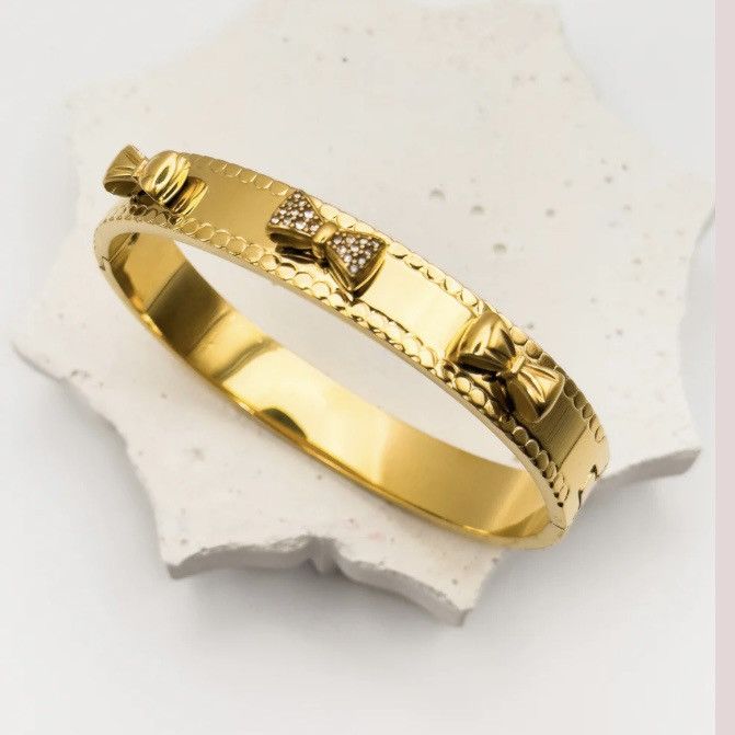 Other Gold tone hinged bow bangle bracelet Size ONE SIZE - 3 Thumbnail