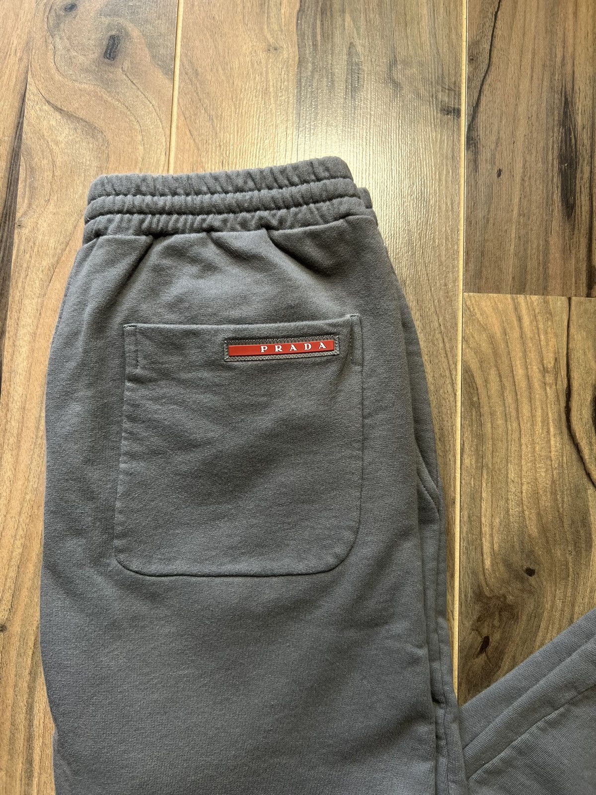 Prada Prada red tap pants joggers sweat Size US 30 / EU 46 - 2 Thumbnail