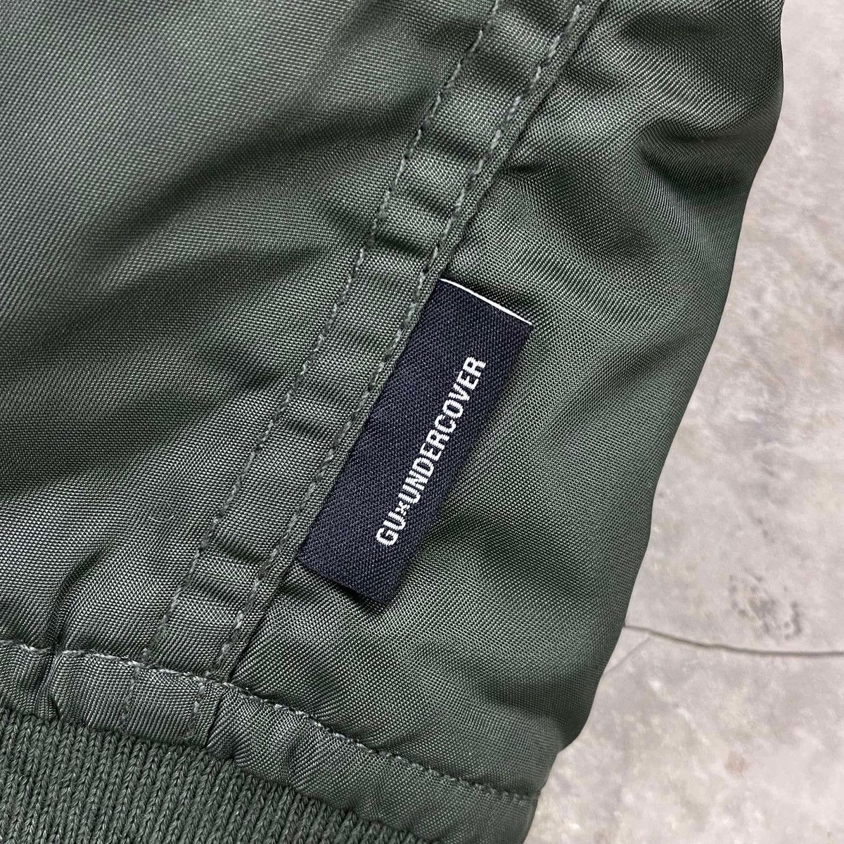 GU × Undercover Oversized Freedom Noise Bomber Size US M / EU 48-50 / 2 - 4 Thumbnail