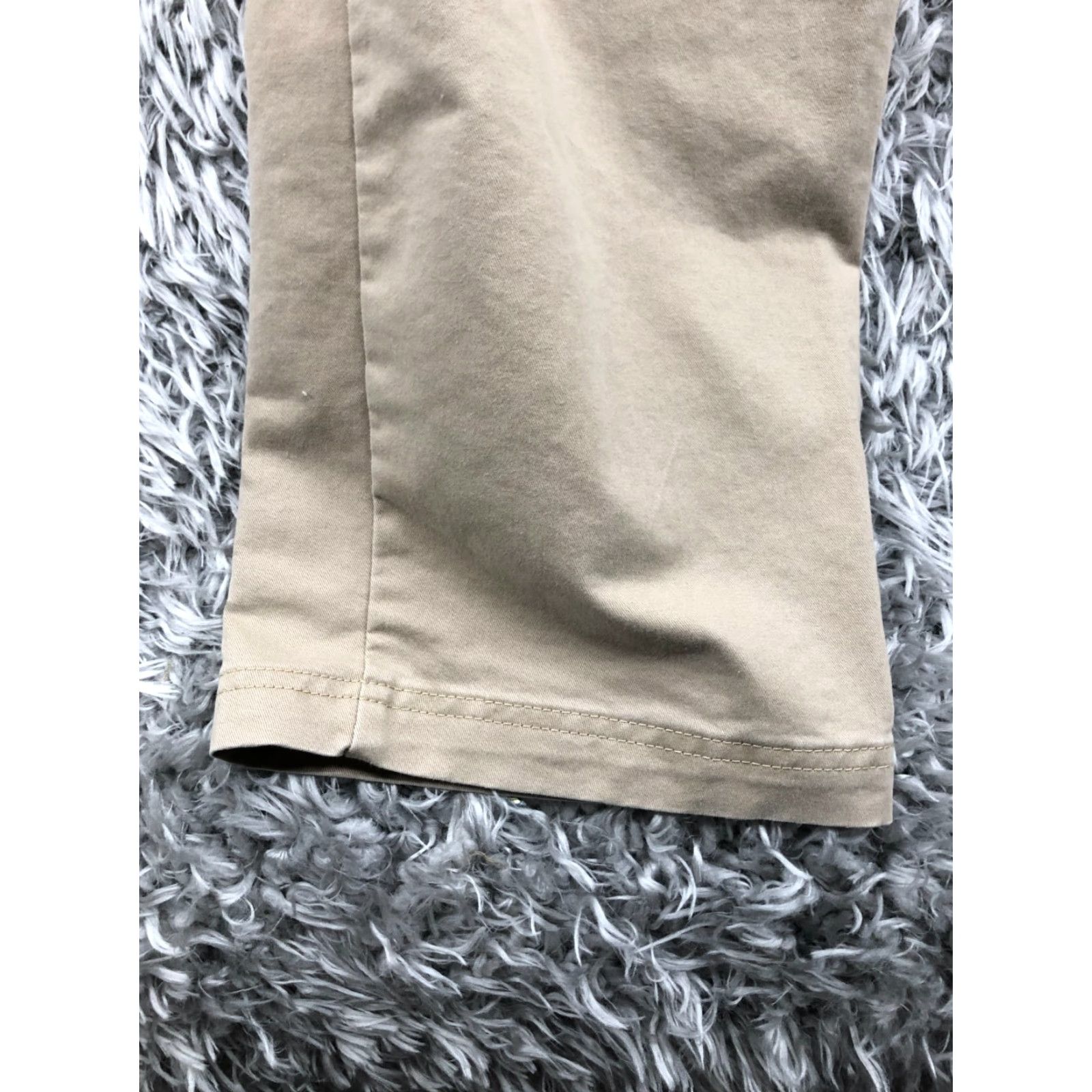 Izod Izod Chino Pants Mens Size 34x34 Beige Straight Rise Mid 34 Inseam 5-Pocket Solid Zipper Button Logo Regular Knit Polyester Blend Front Flat Front Size US 34 / EU 50 - 7 Thumbnail